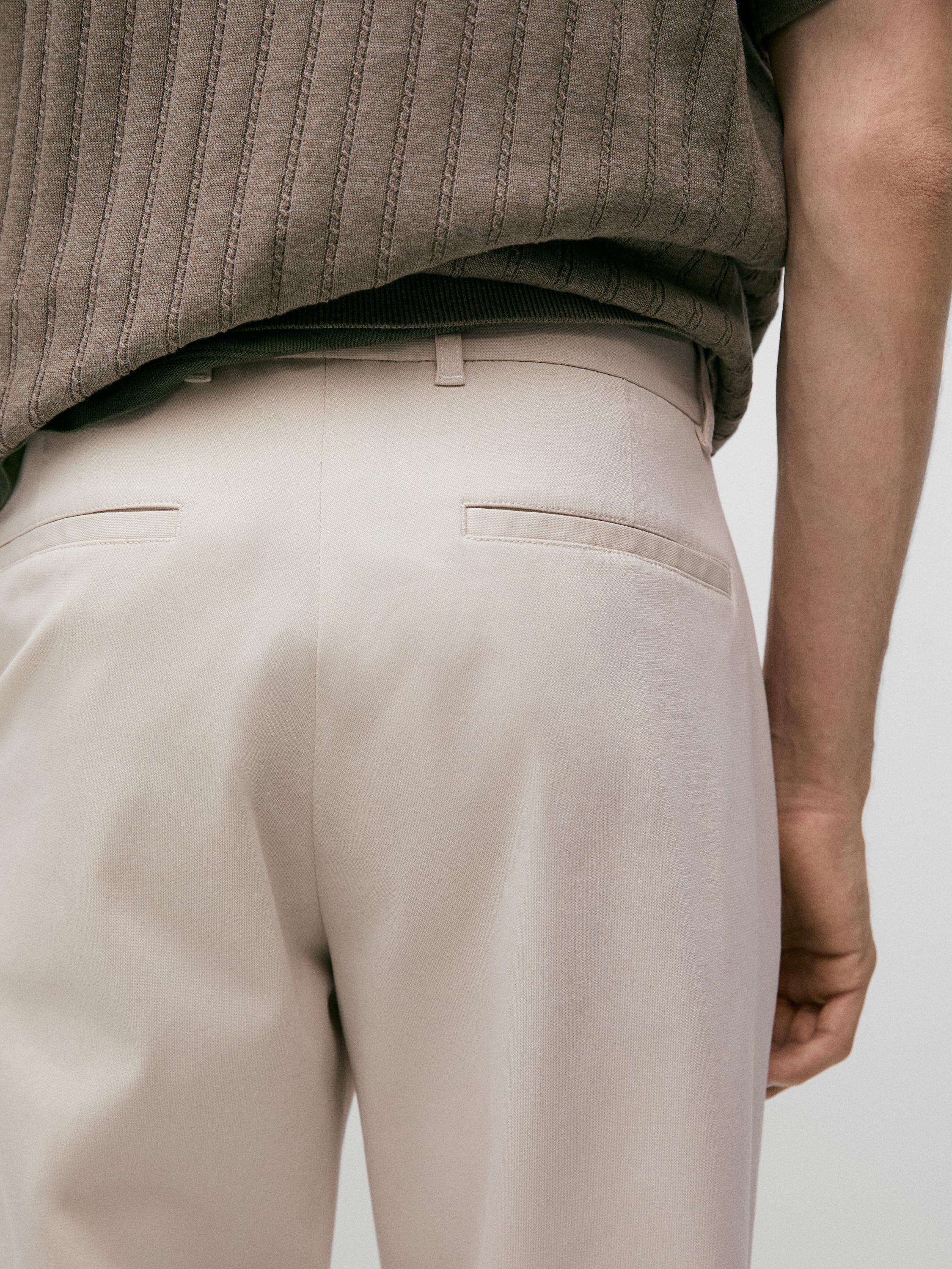 Cotton blend tapered fit trousers — BEIGE