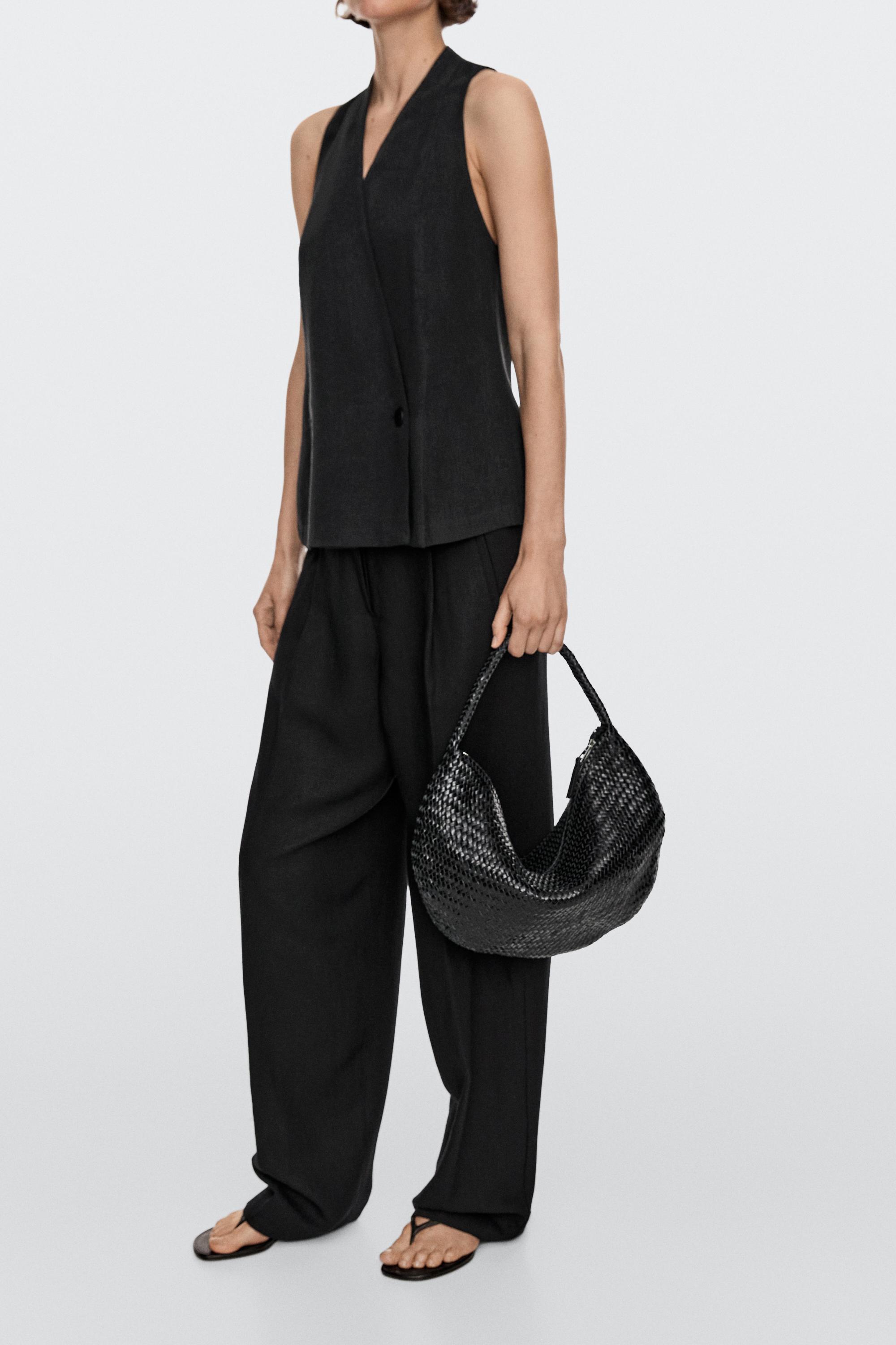 Braided leather half-moon bag — BLACK