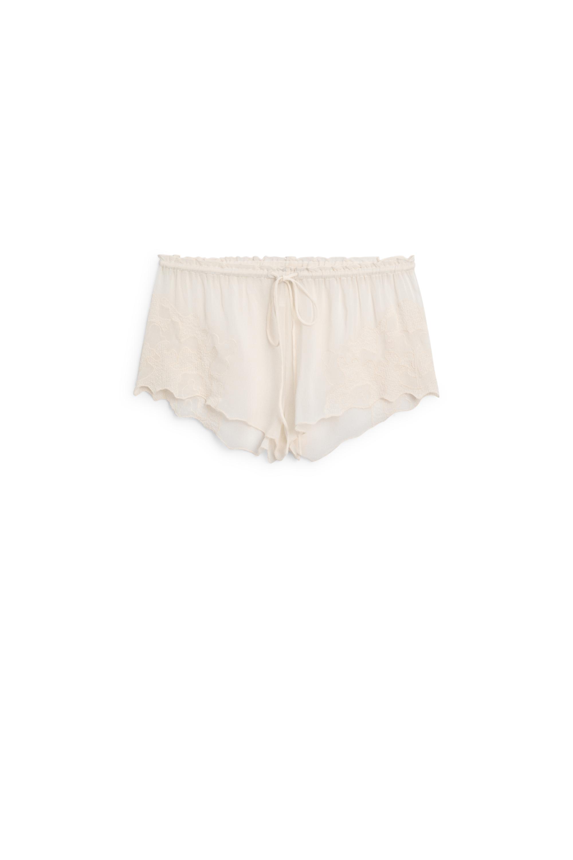 Flowing shorts with embroidered detail — CREAM
