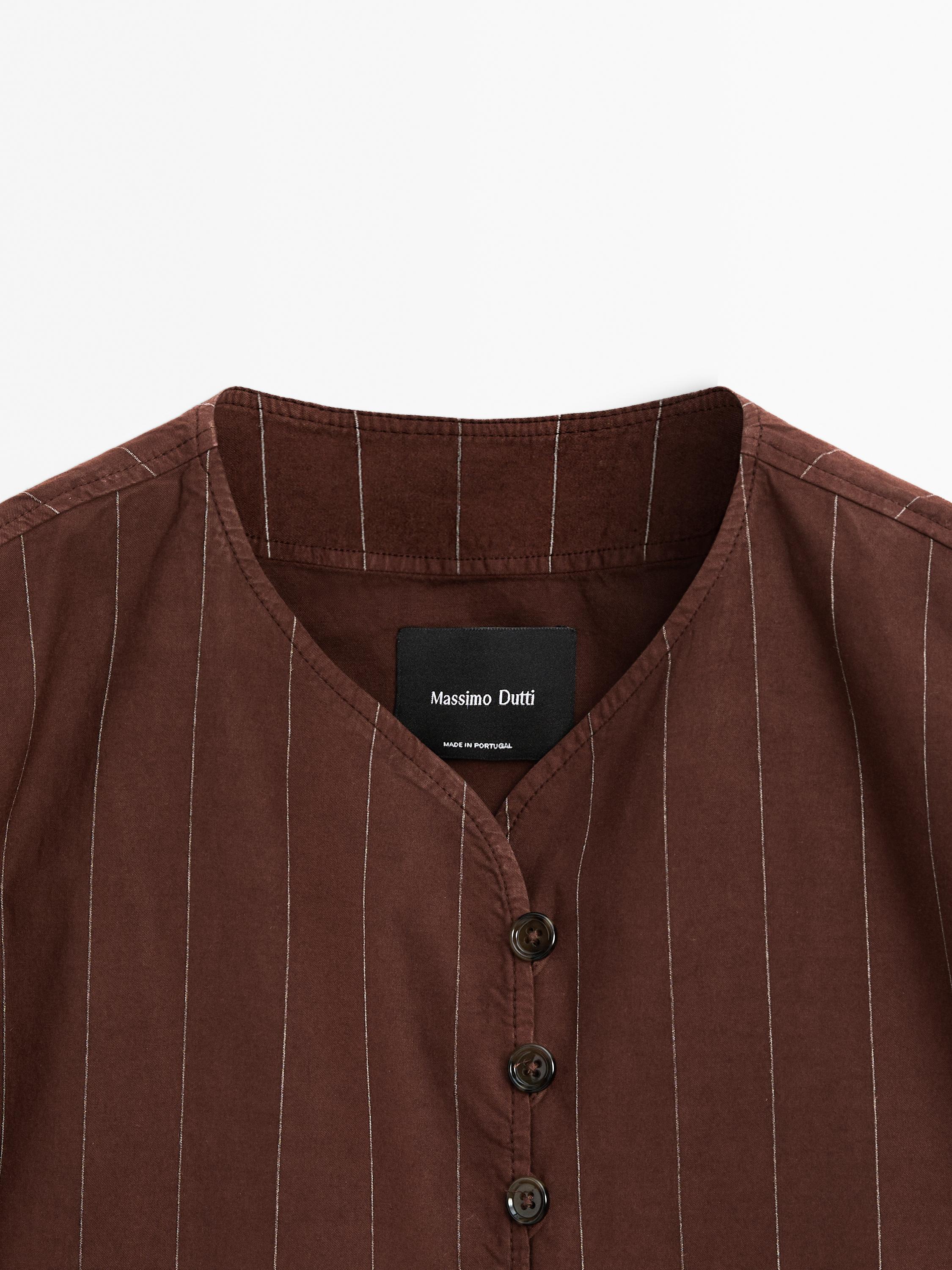 Striped jacket with button detail