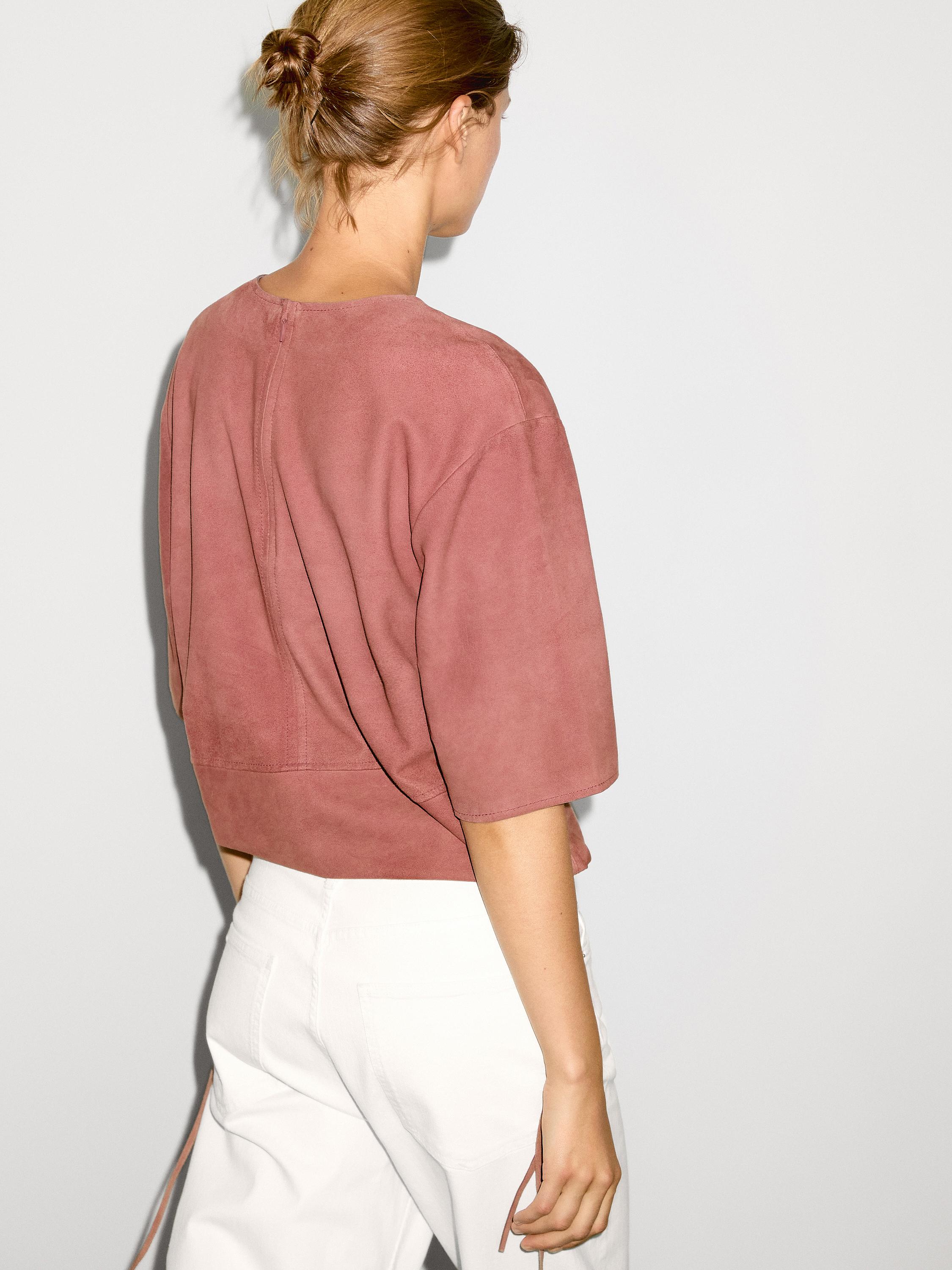 Suede leather top with strap detail