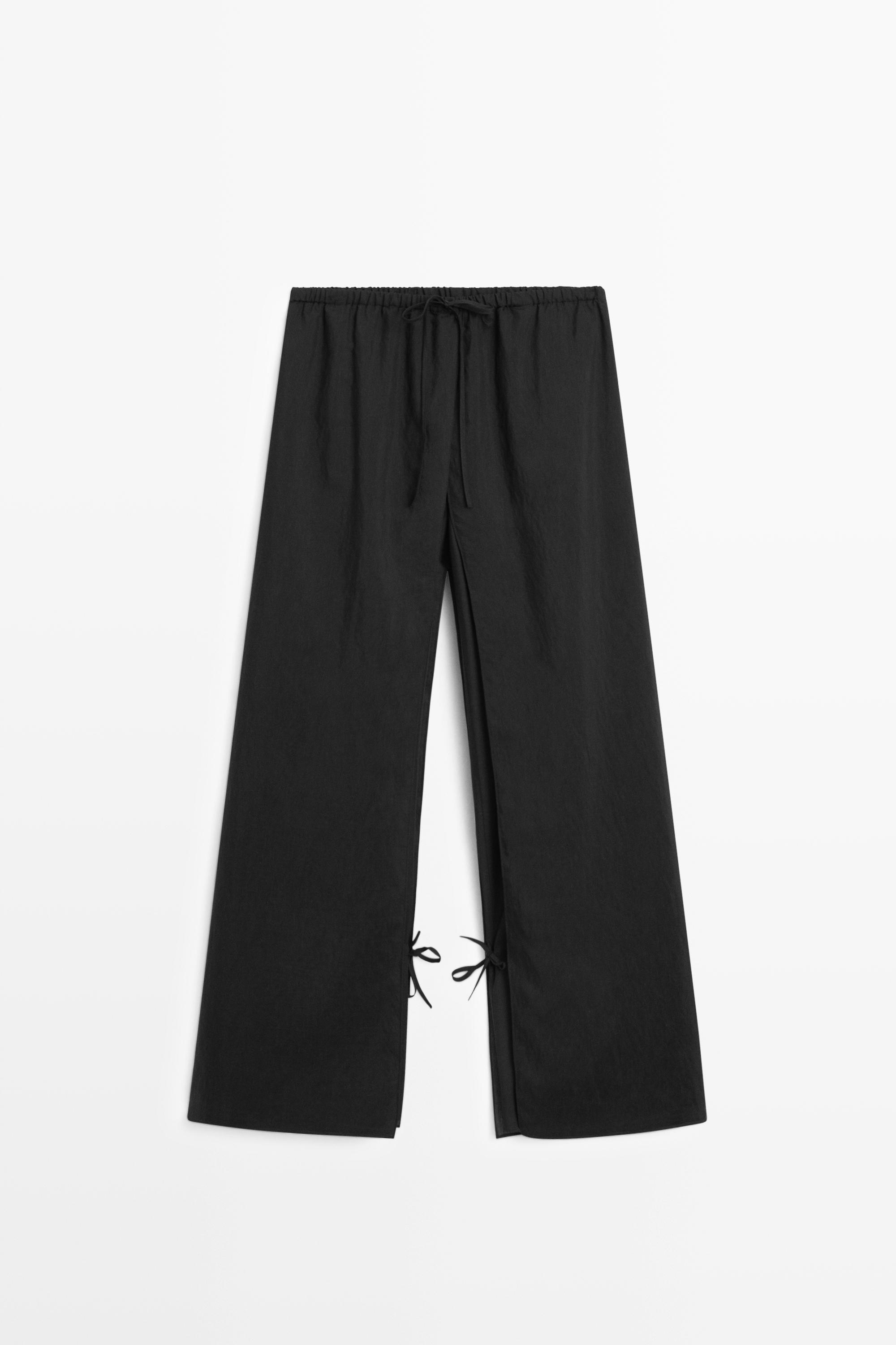 Double-layer pants with tie detail — BLACK