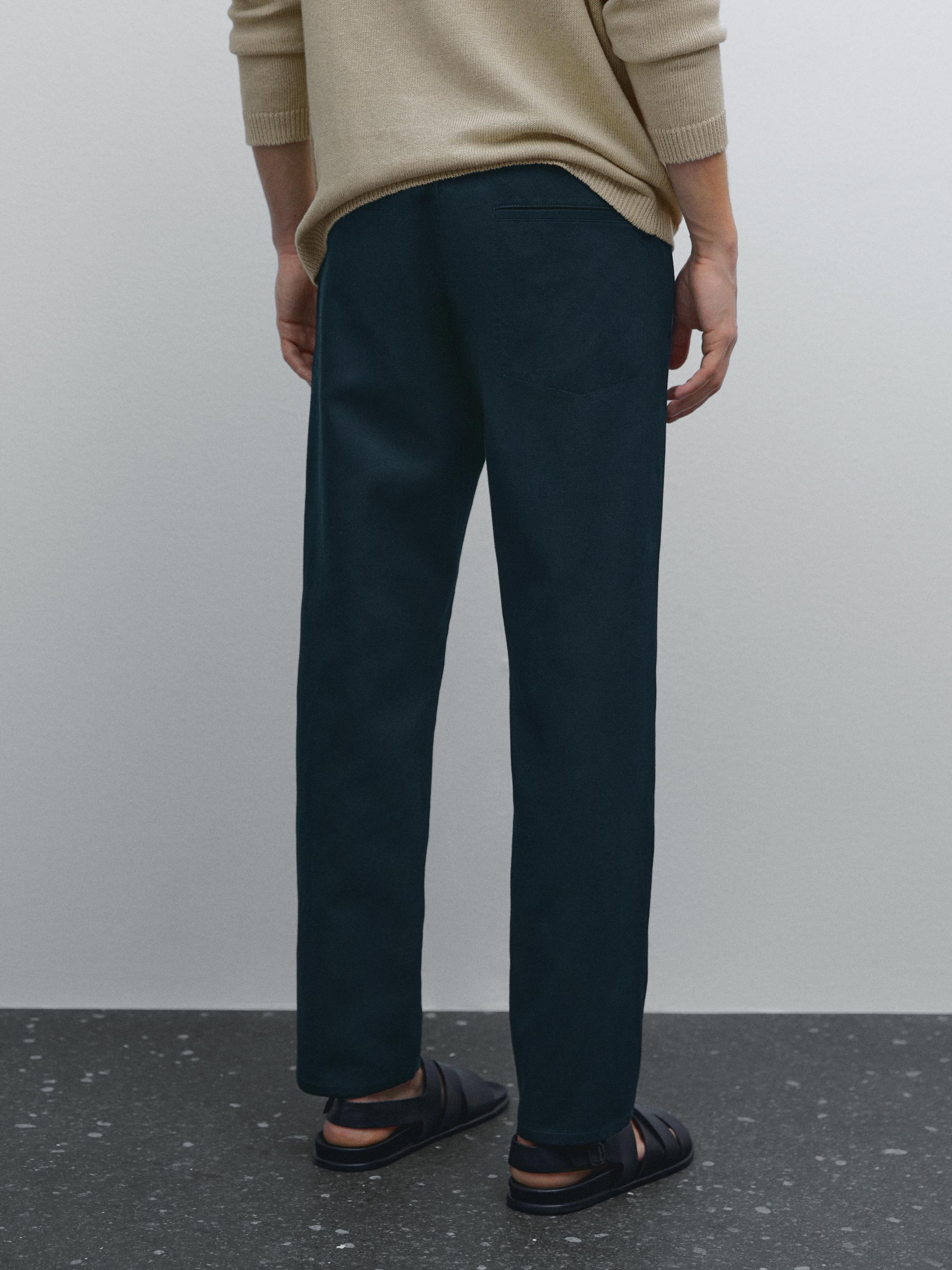 Cotton blend tapered fit denim trousers · Navy Blue, Cream