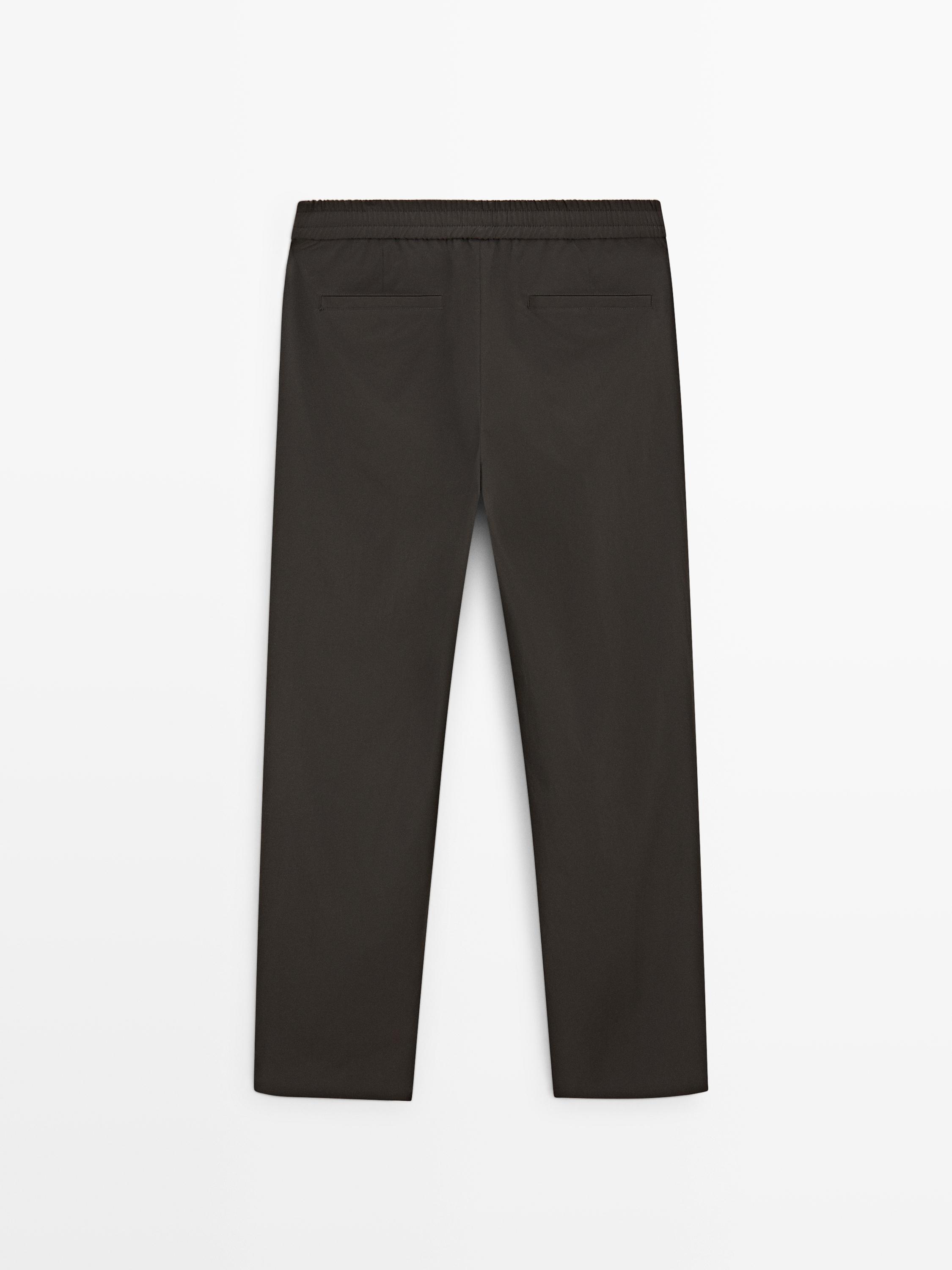 Total look technical trousers — BROWN