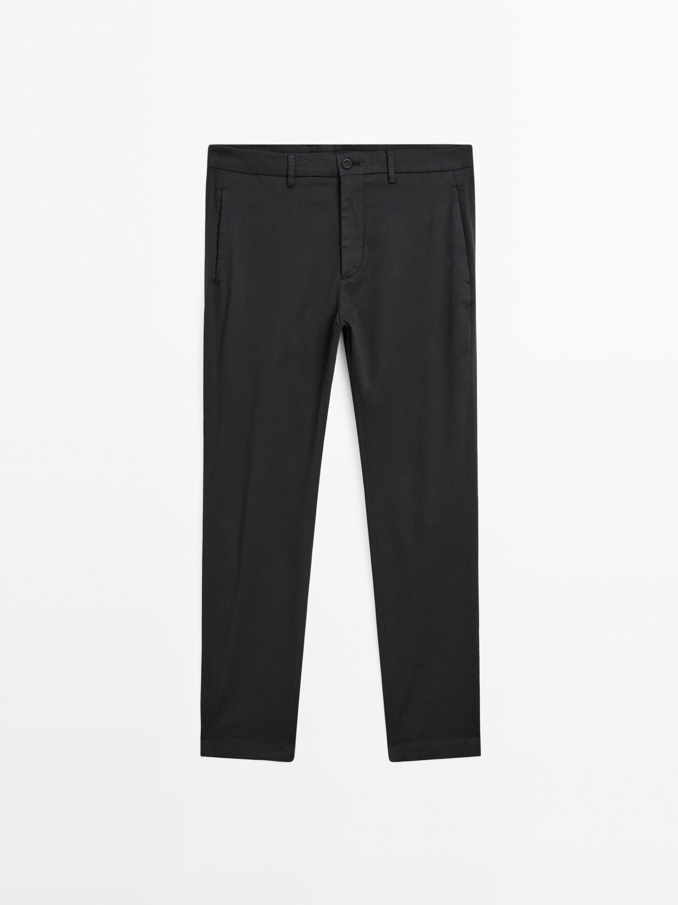 Calças slim fit em mistura de algodão