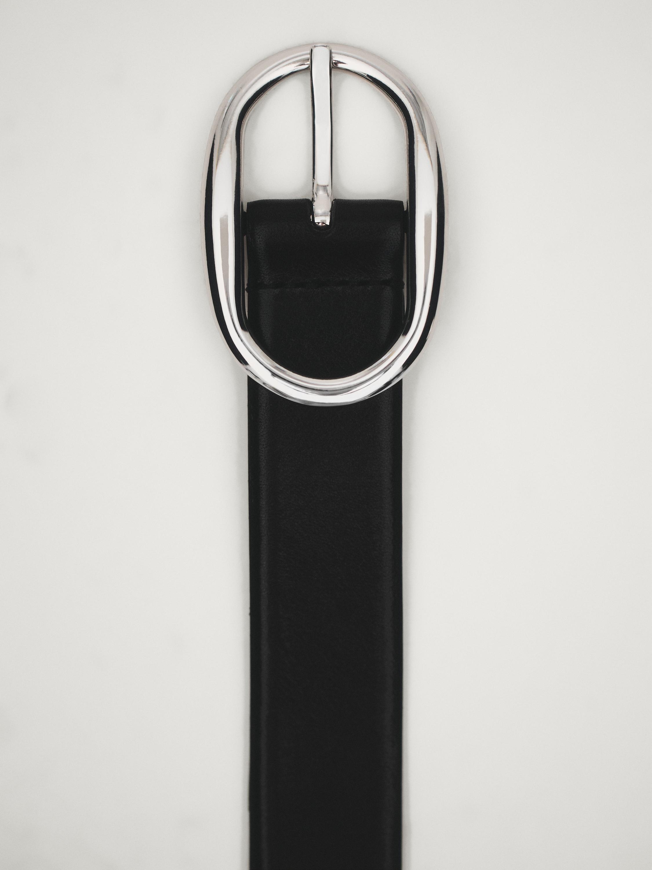 Leather belt with oval buckle