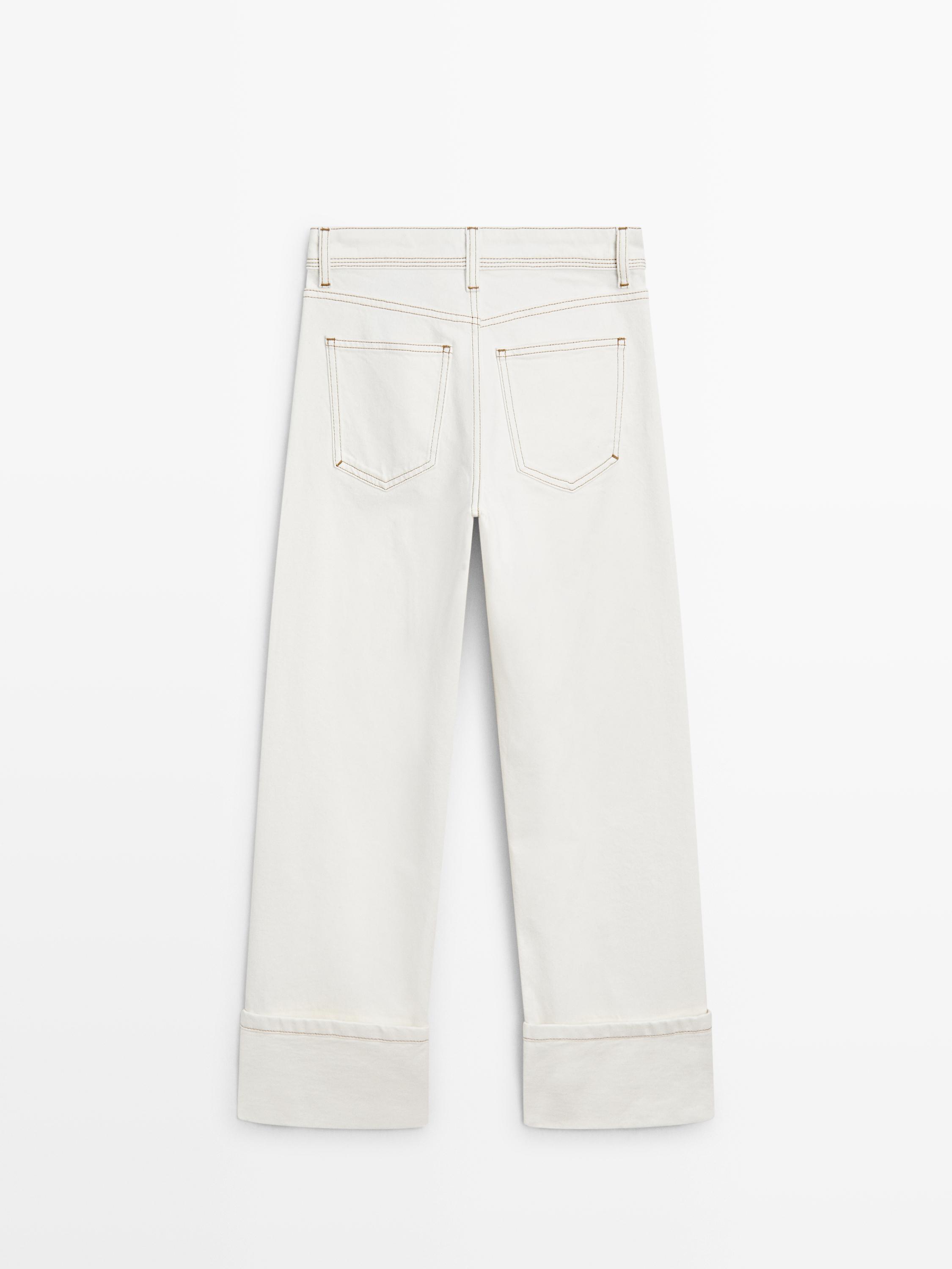 Jeans detalle bajo straight fit