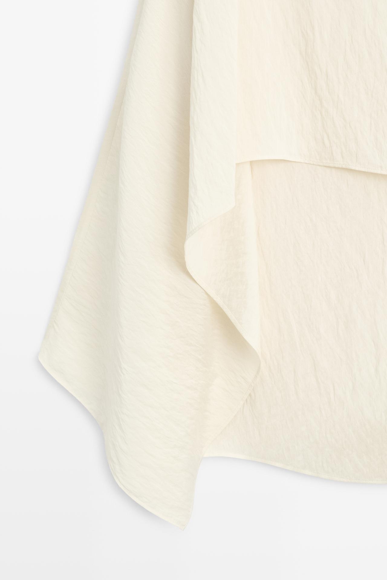 Flowing cape-style blouse — Off white