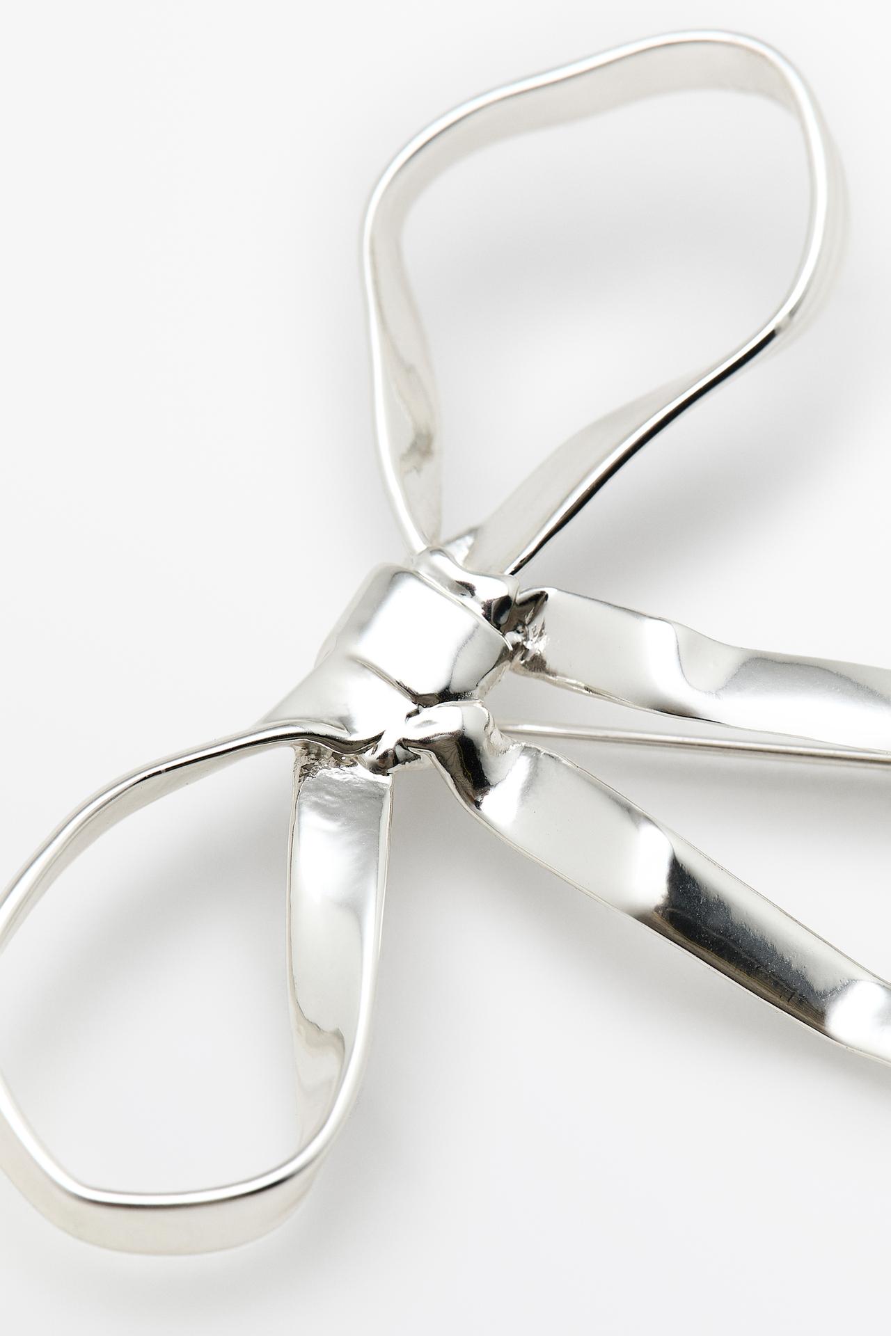 Bow brooch — SILVER