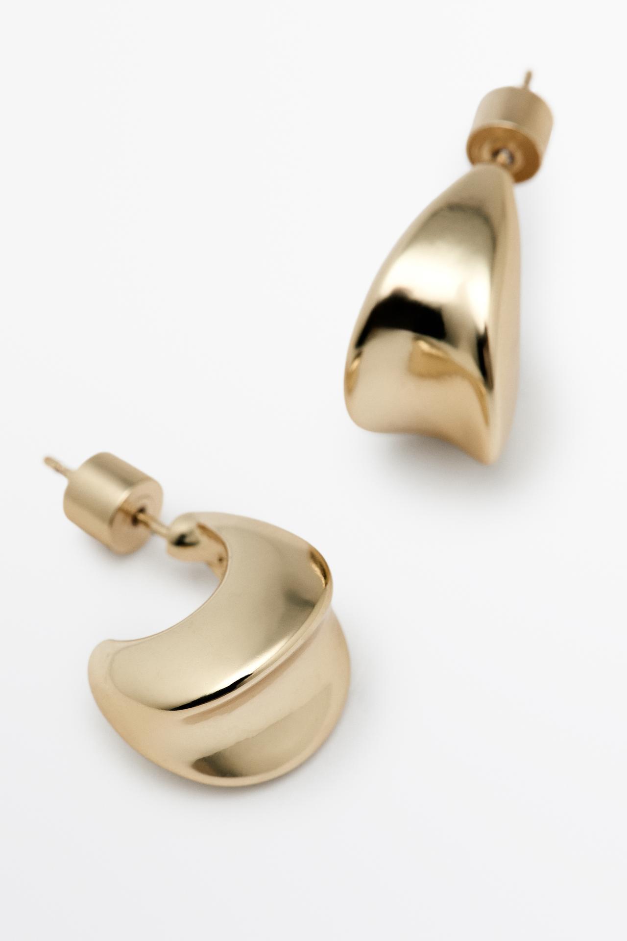 Curved hoop earrings — GOLDEN