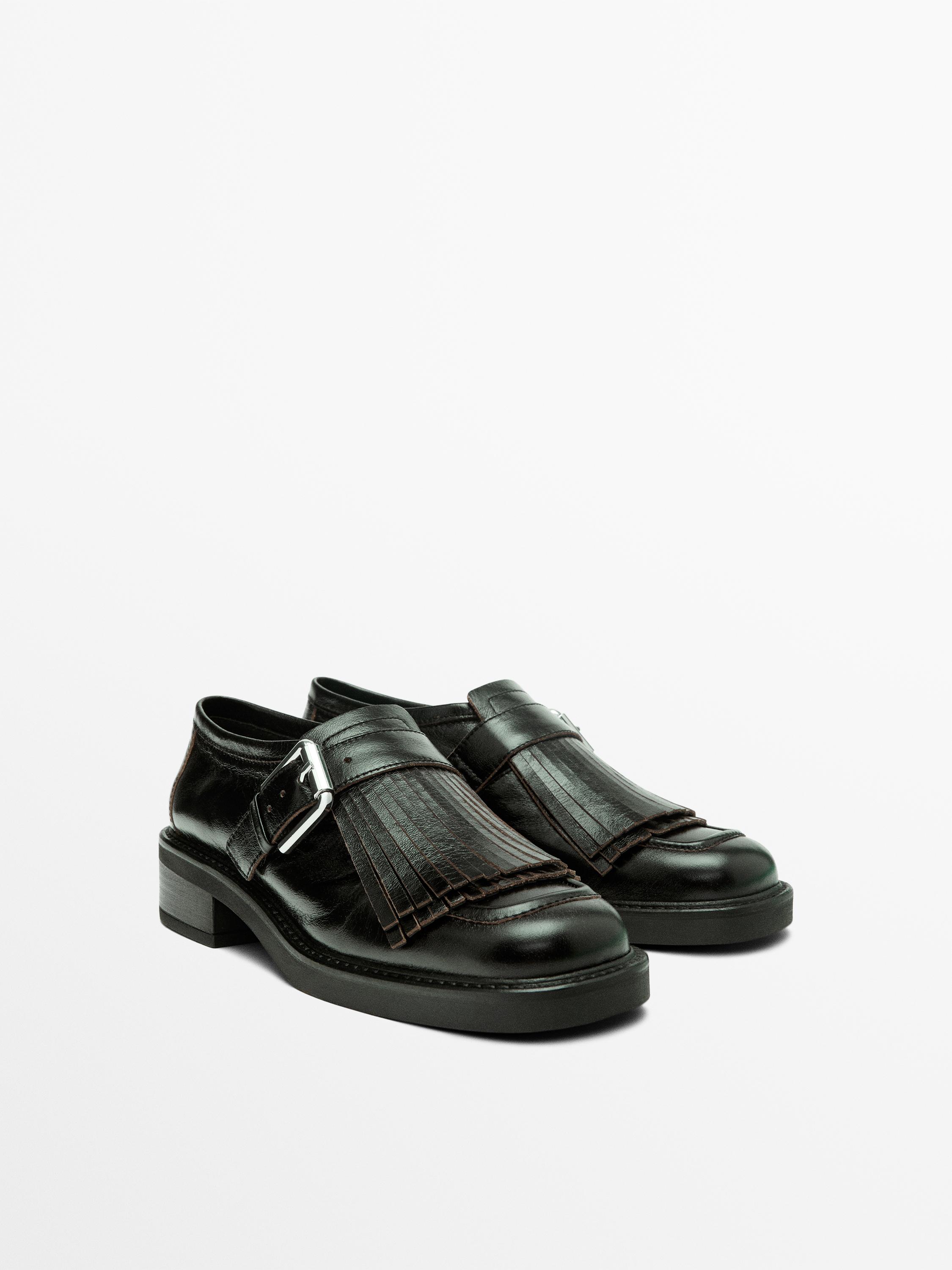 Buckled derby shoes with fringe — BLACK