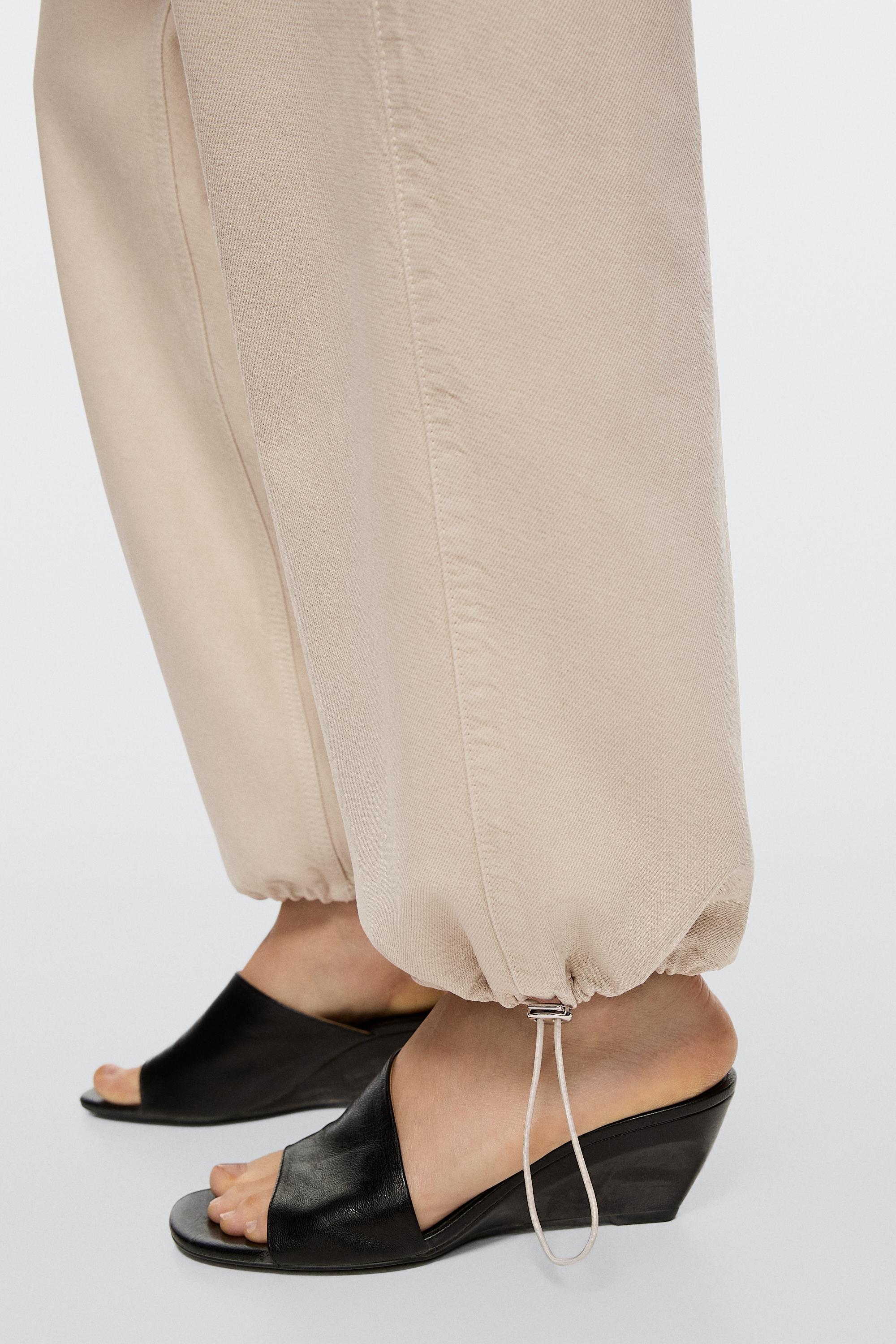 Relaxed fit parachute pants — BEIGE