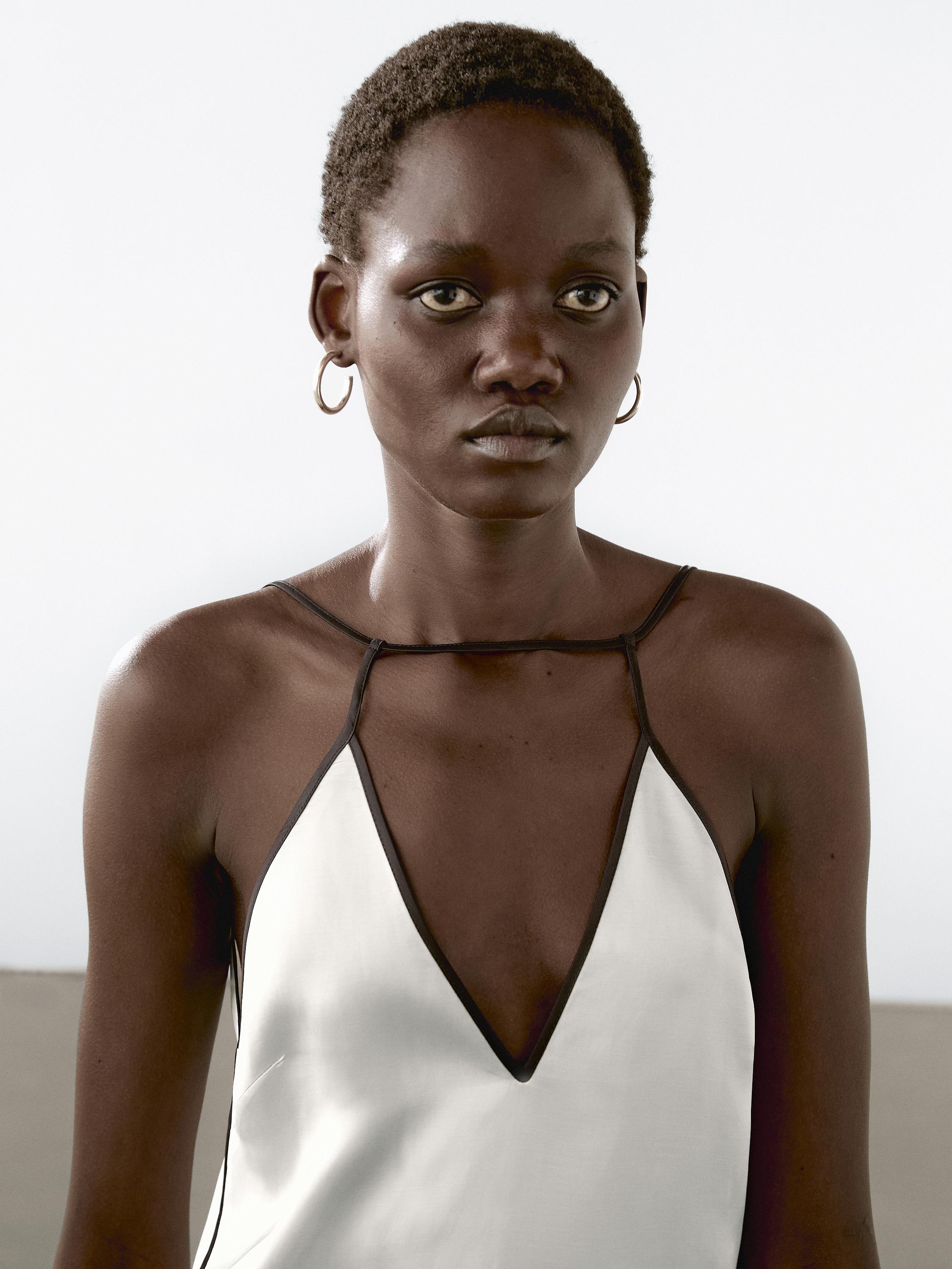 Satin halter top with trims