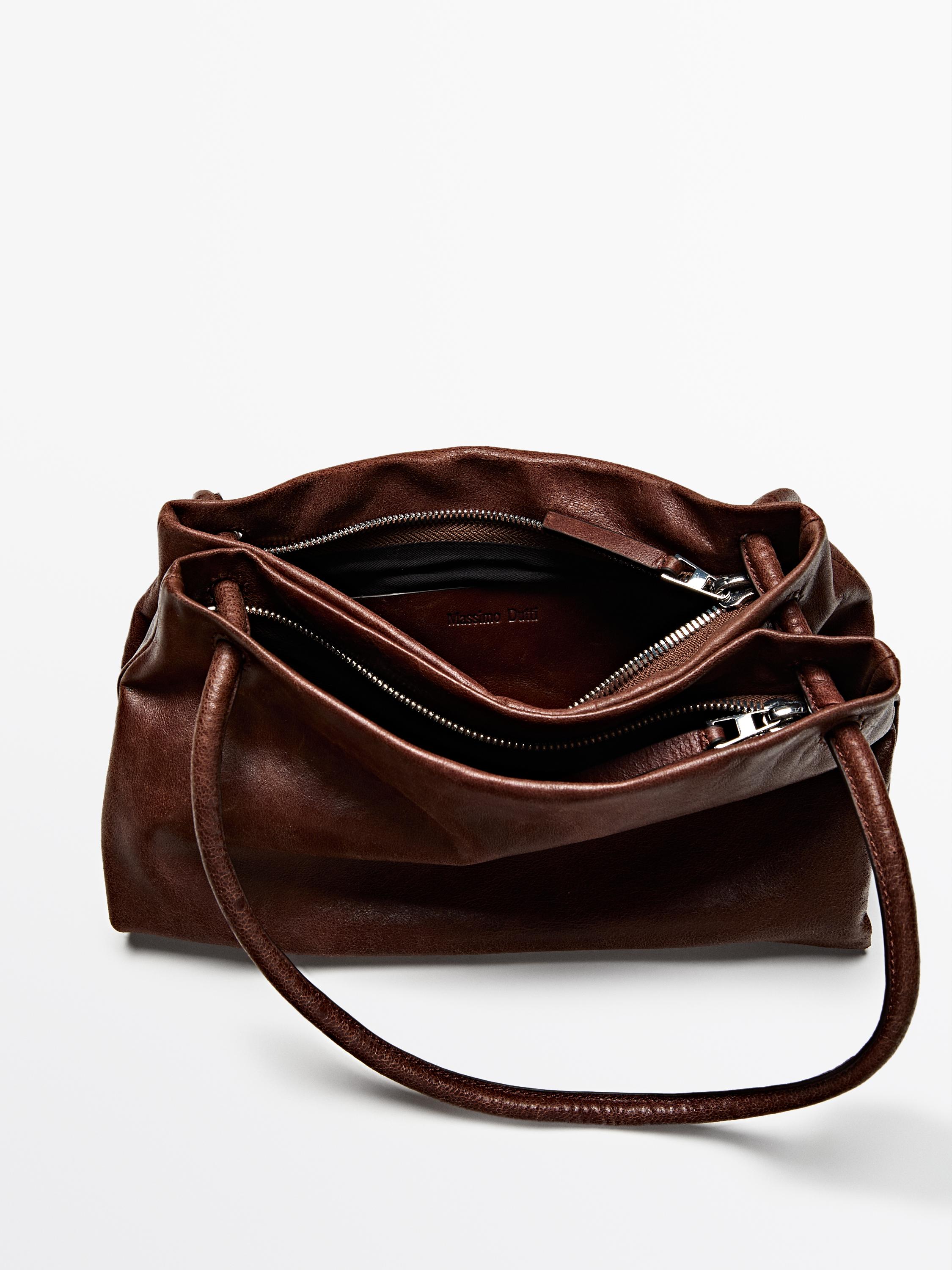 Small nappa leather bag with compartments
