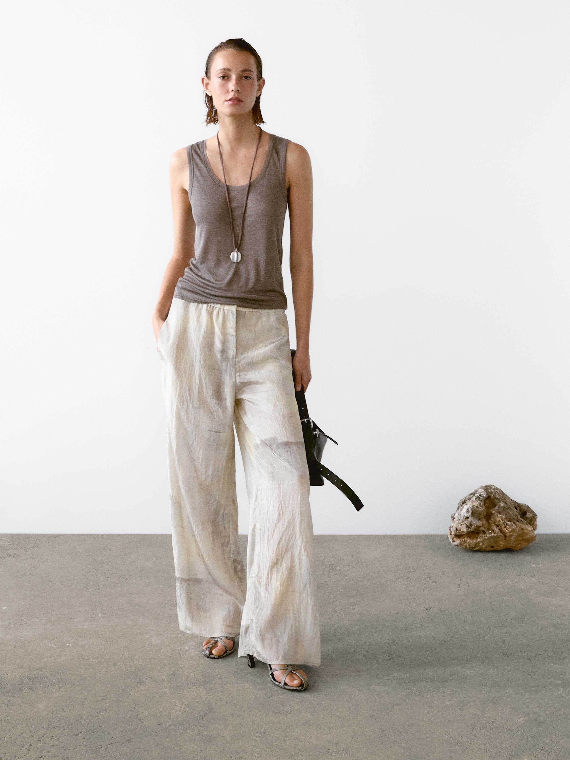 Round neck top with seam details