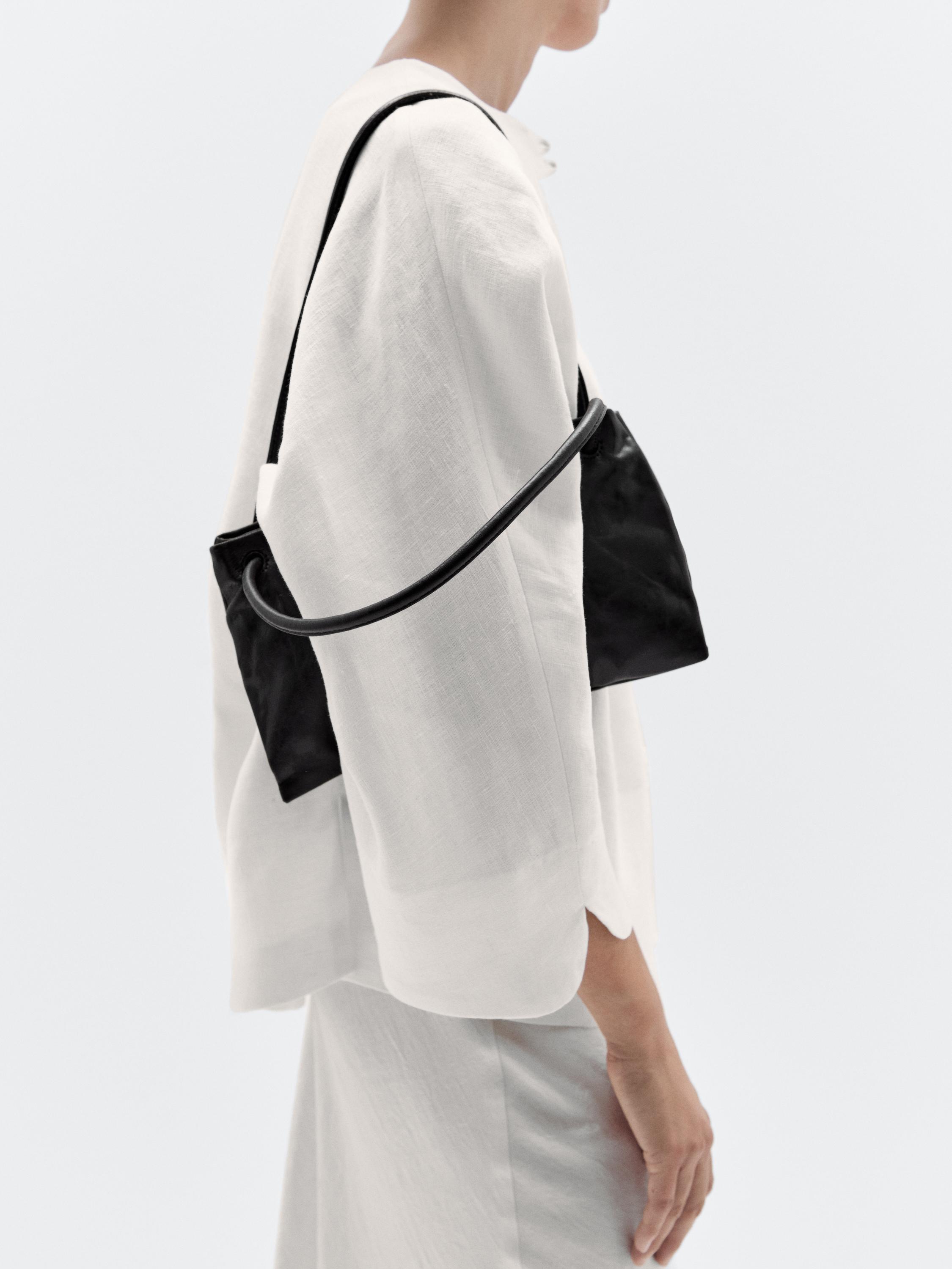Small nappa leather bag with compartments