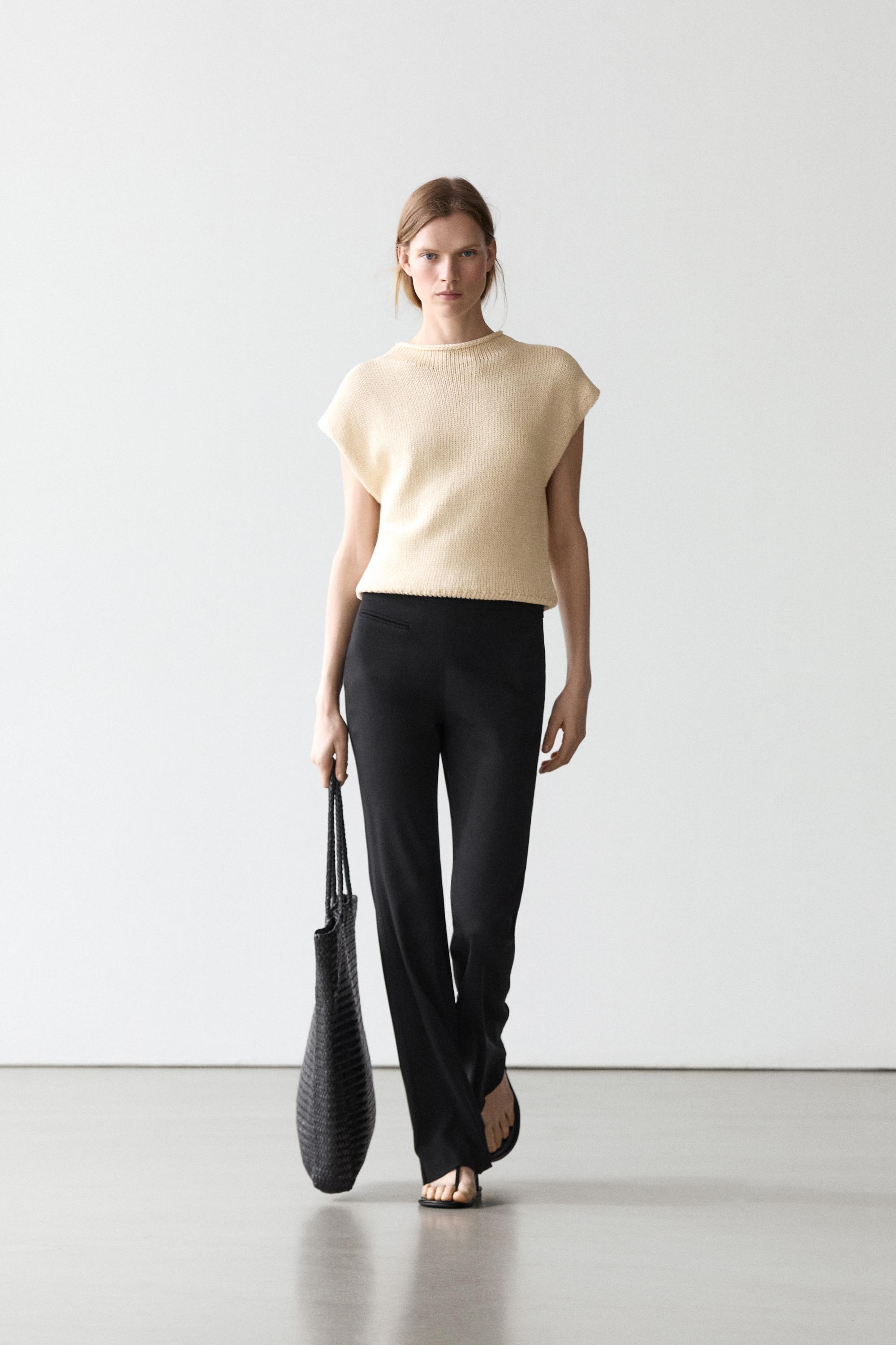 Flared trousers with pocket — BLACK