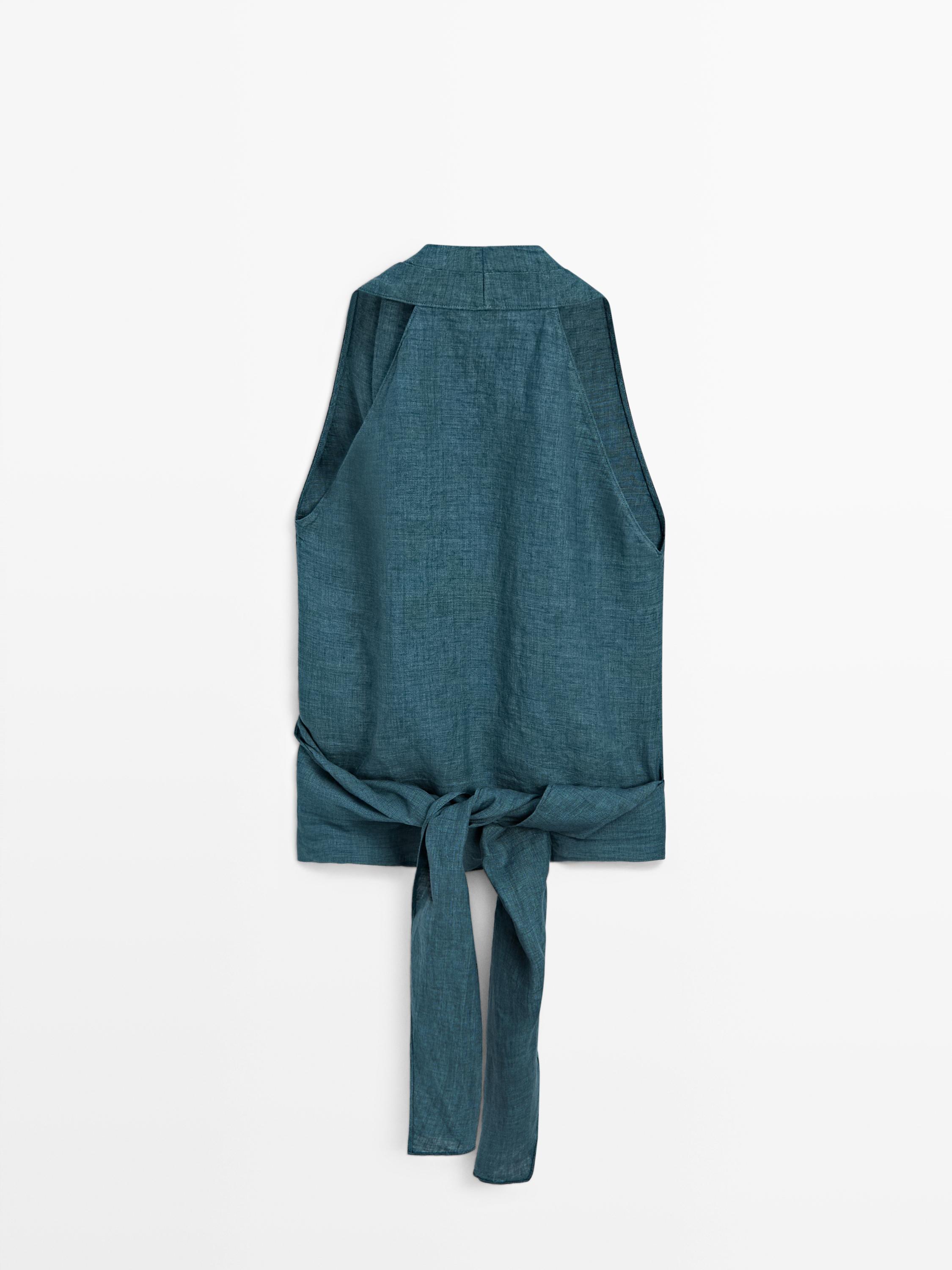 täislinane hõlmiksärk lipsuga