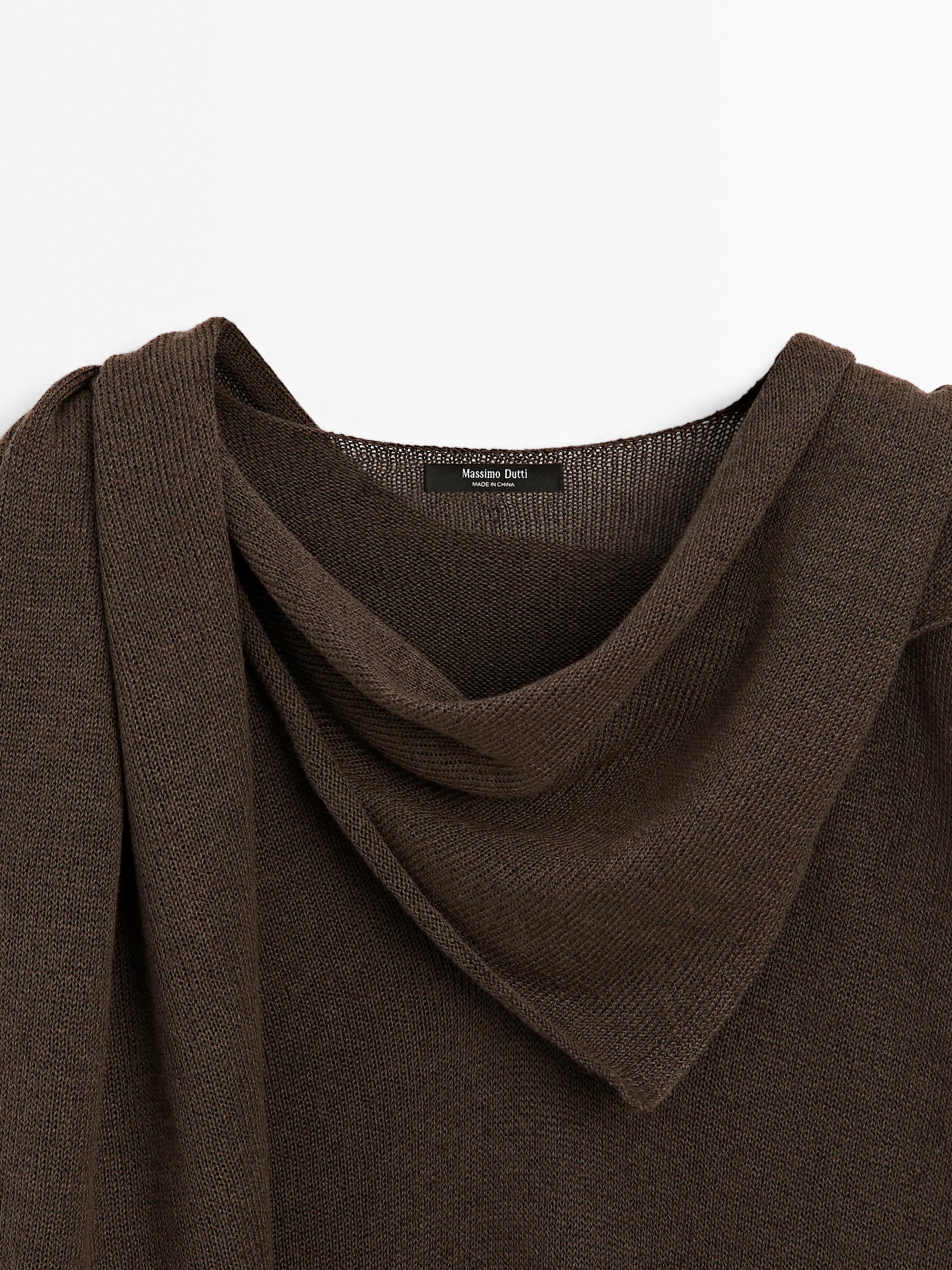 Knit cape with scarf