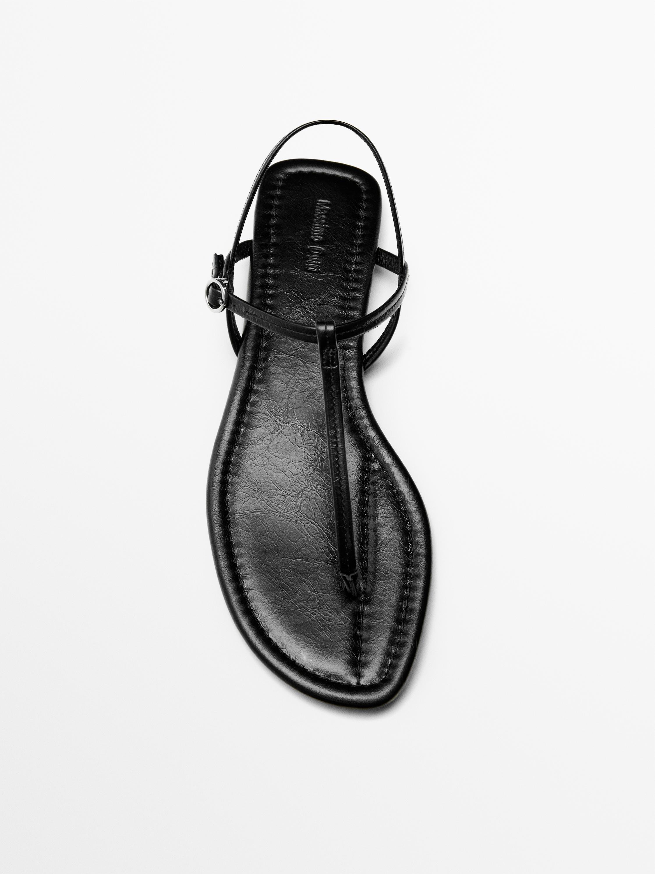 Strappy flat sandals with toe divider — BLACK