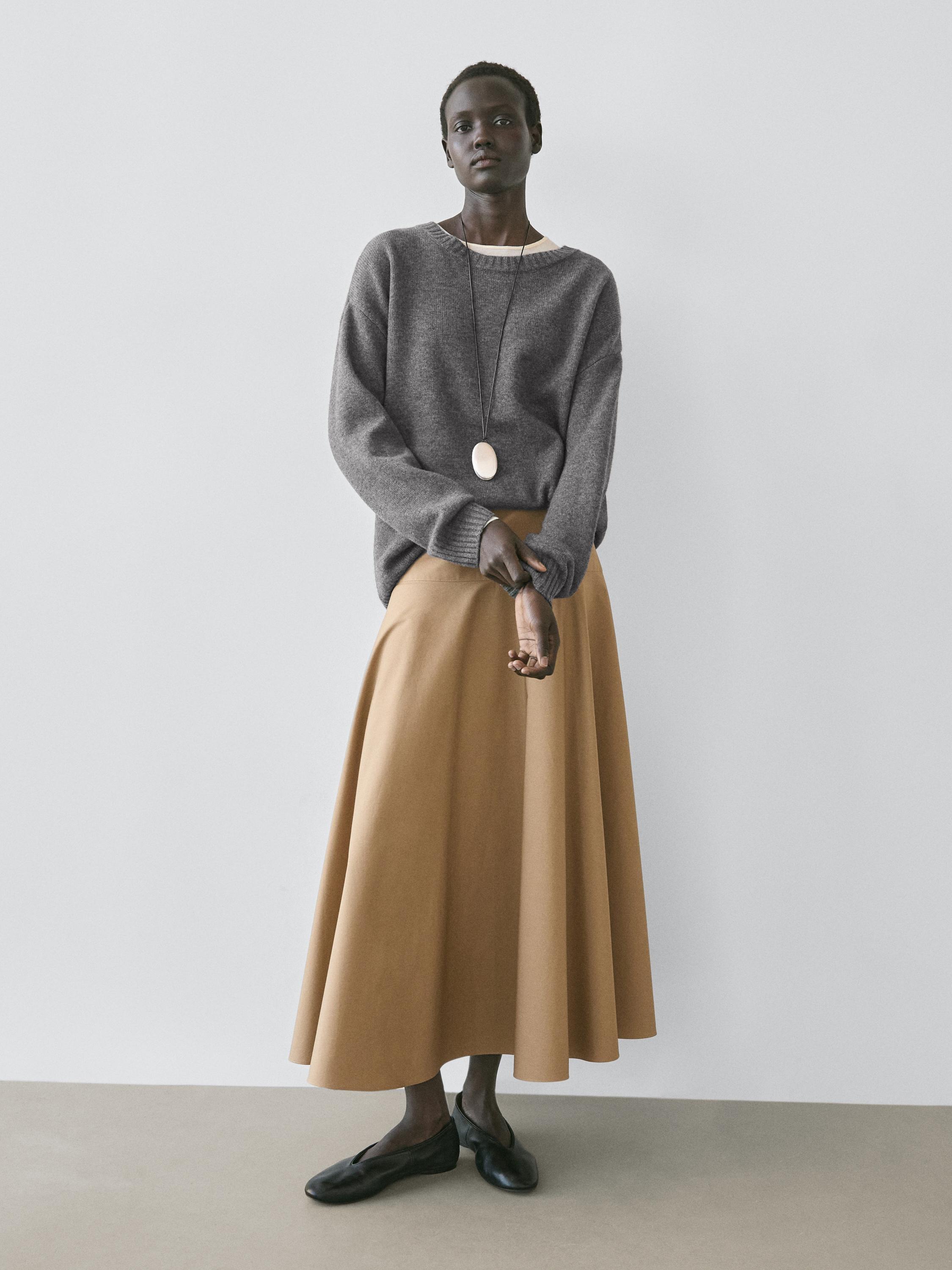 تنورة ميدي بتصميم كلوش وياك