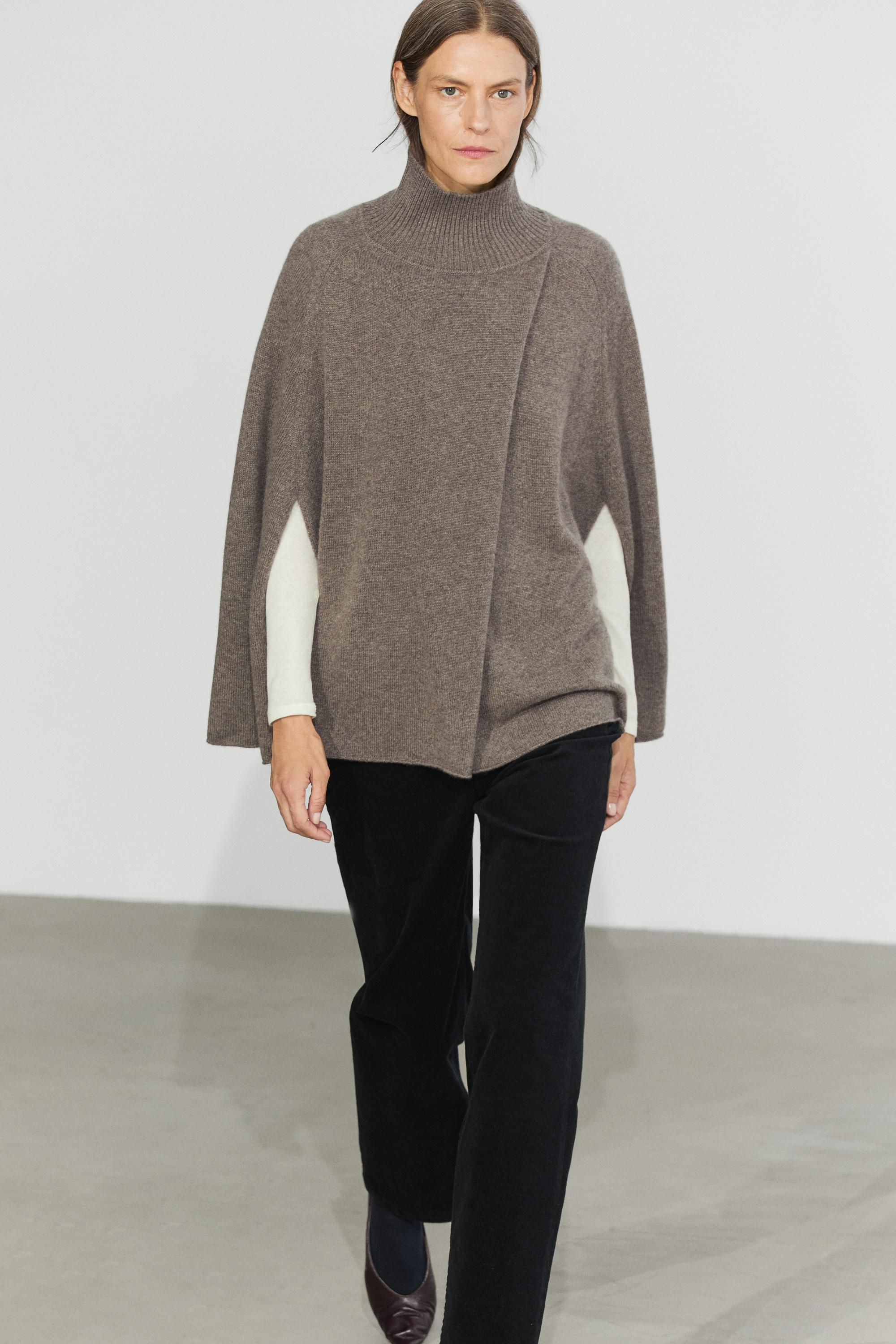 100% cashmere knit cape with crossover detail