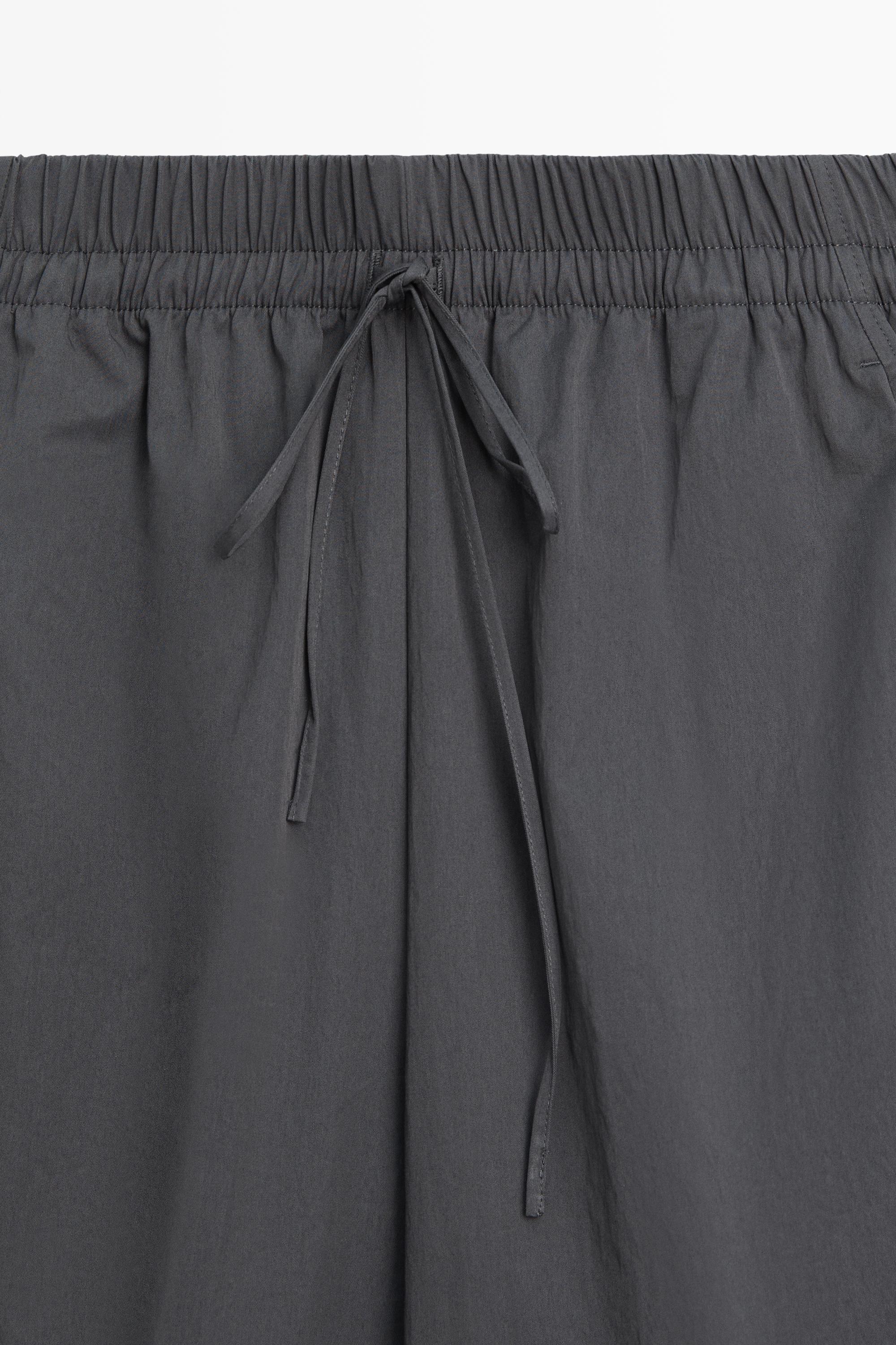 Cropped technical barrel fit pants — Blue