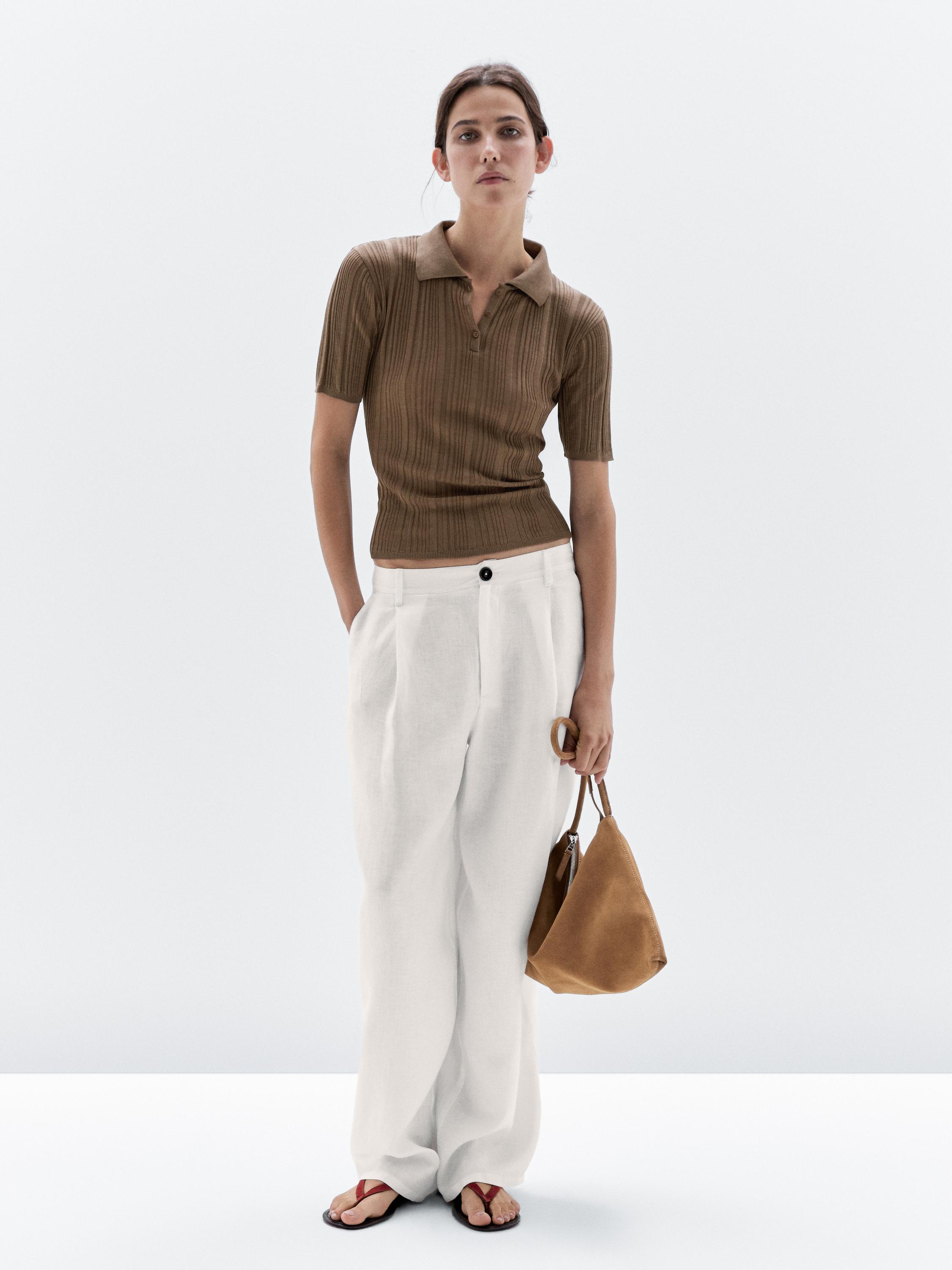 100% cotton polo shirt with ribbed detail