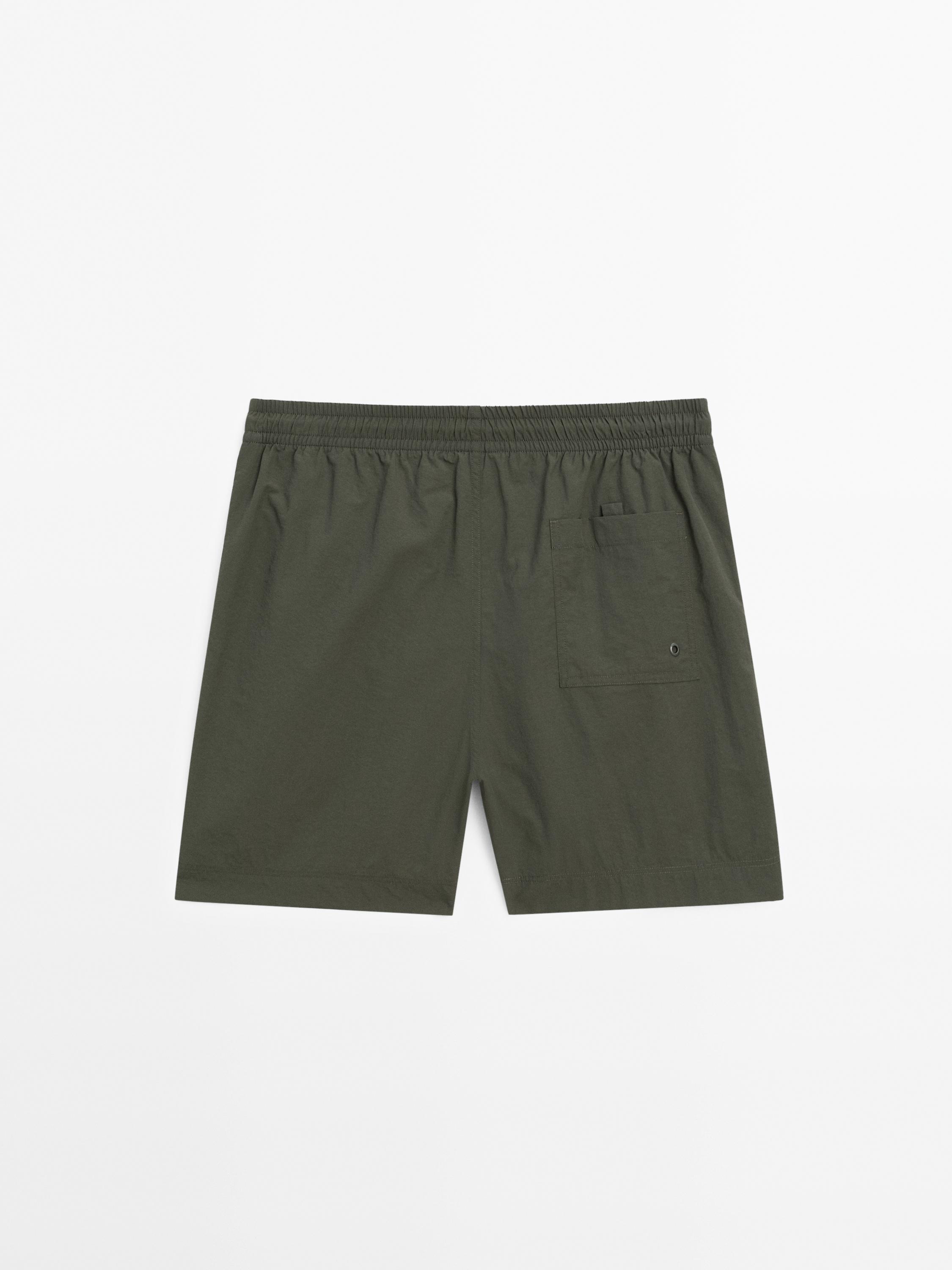 Plain short fit swimming trunks