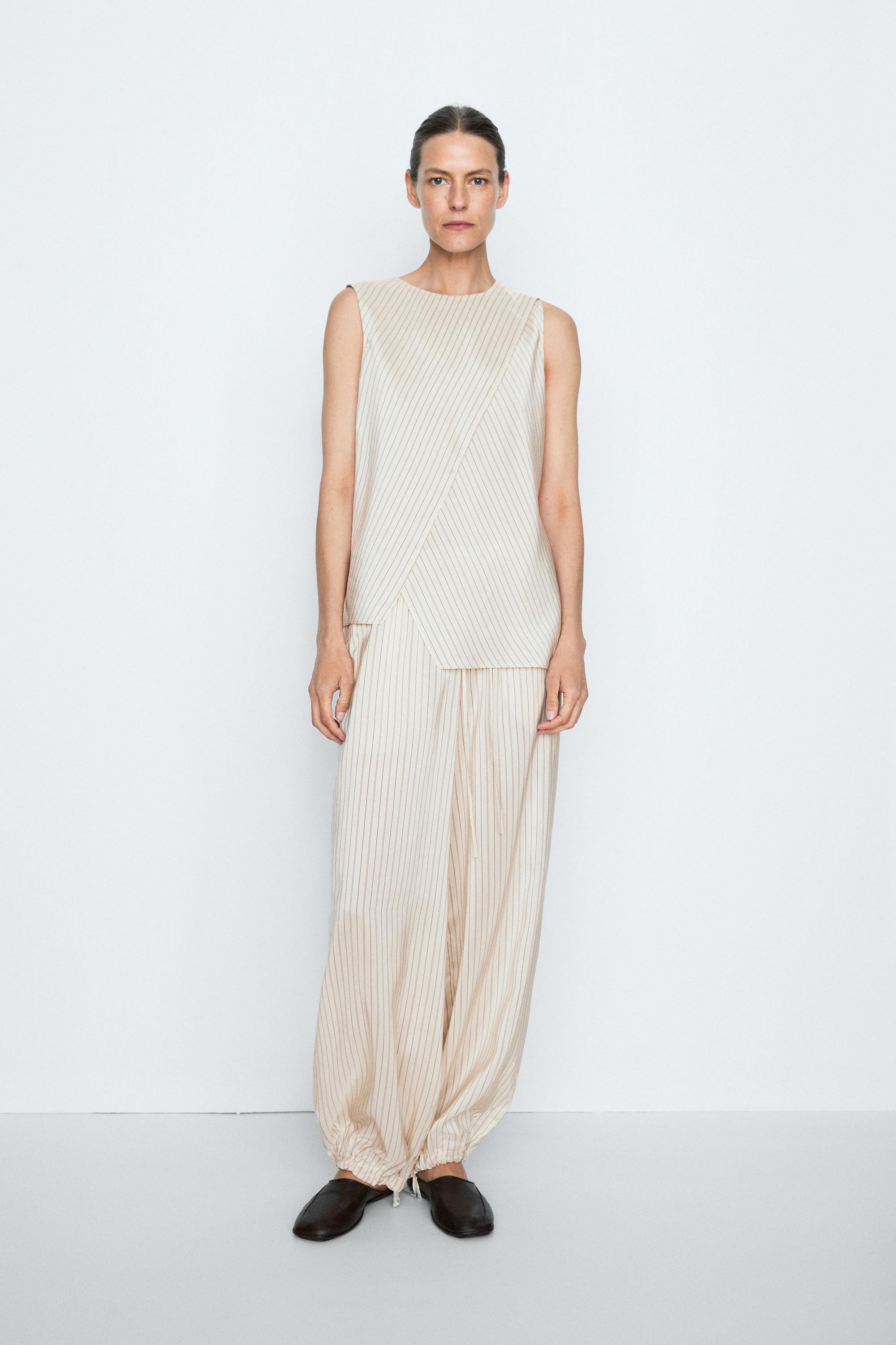 STUDIO flowing striped wrap top — CREAM