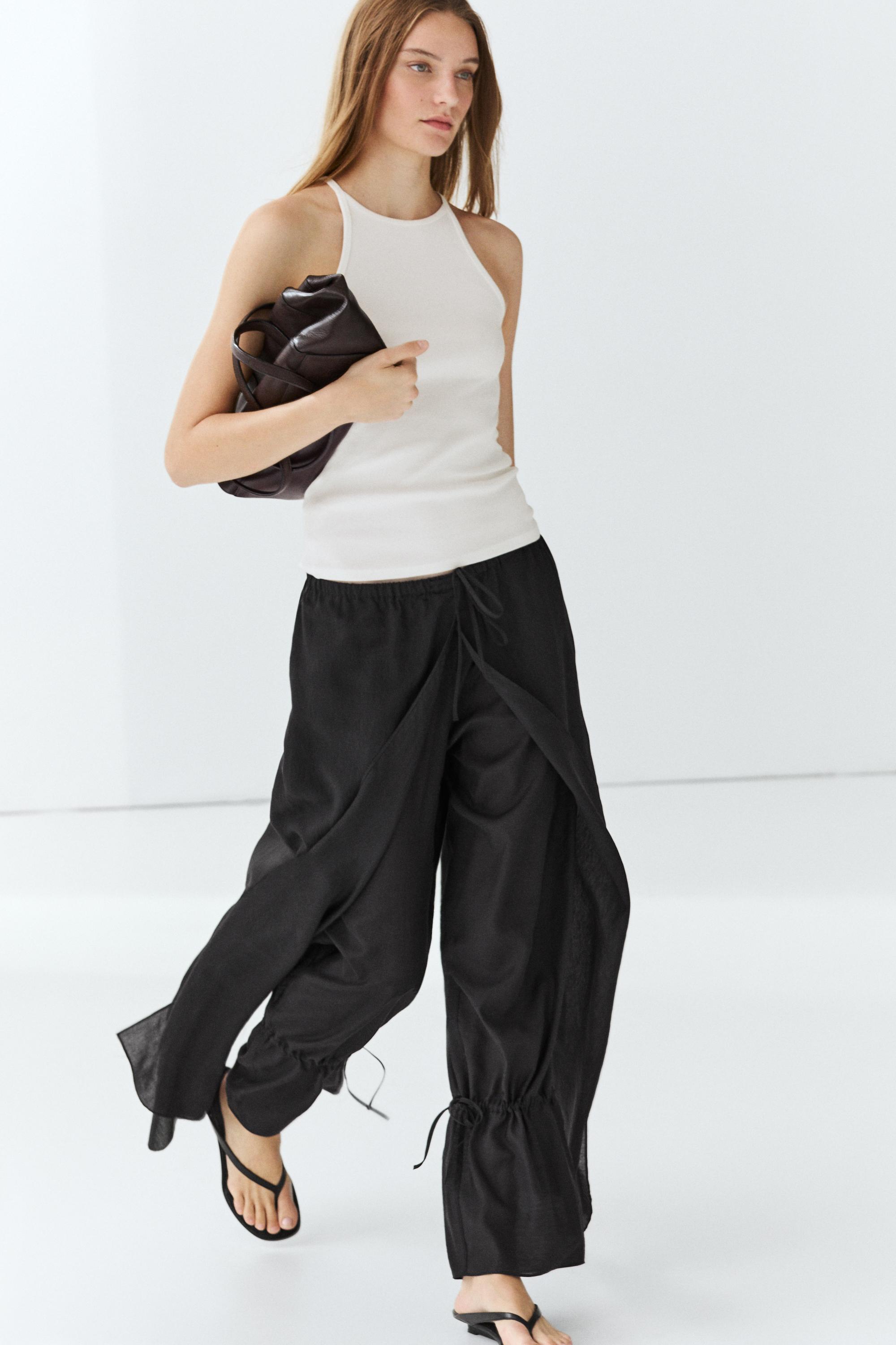 Double-layer pants with tie detail — BLACK