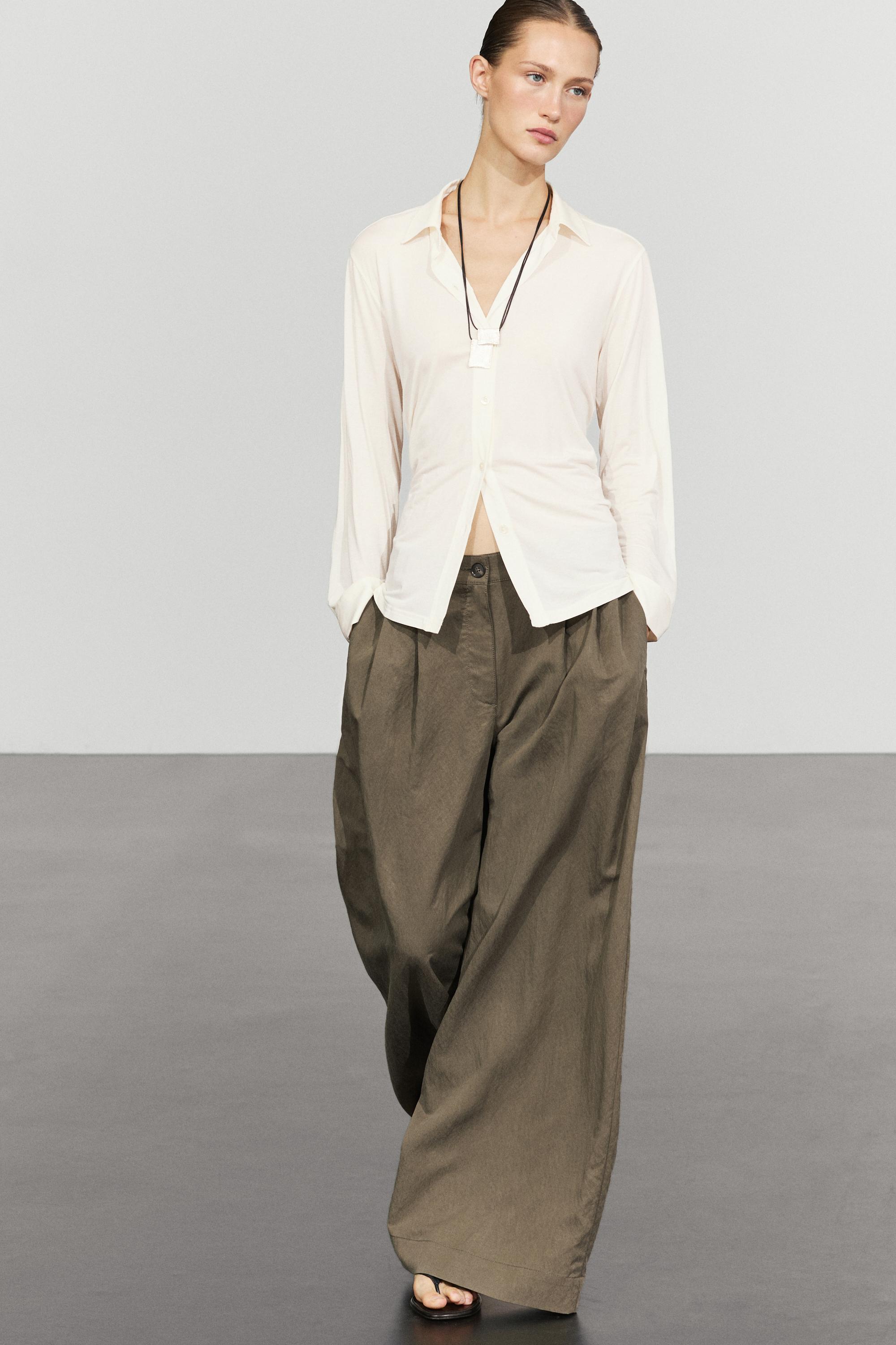 Technical wide-leg pleated pants — MOLE BROWN