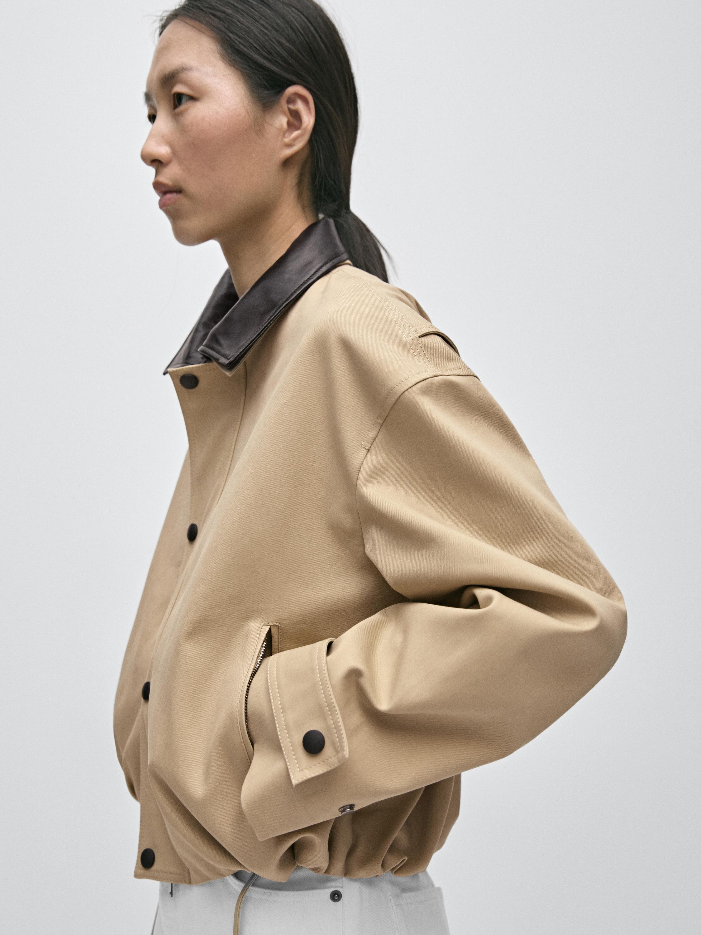 Short jacket with leather collar detail