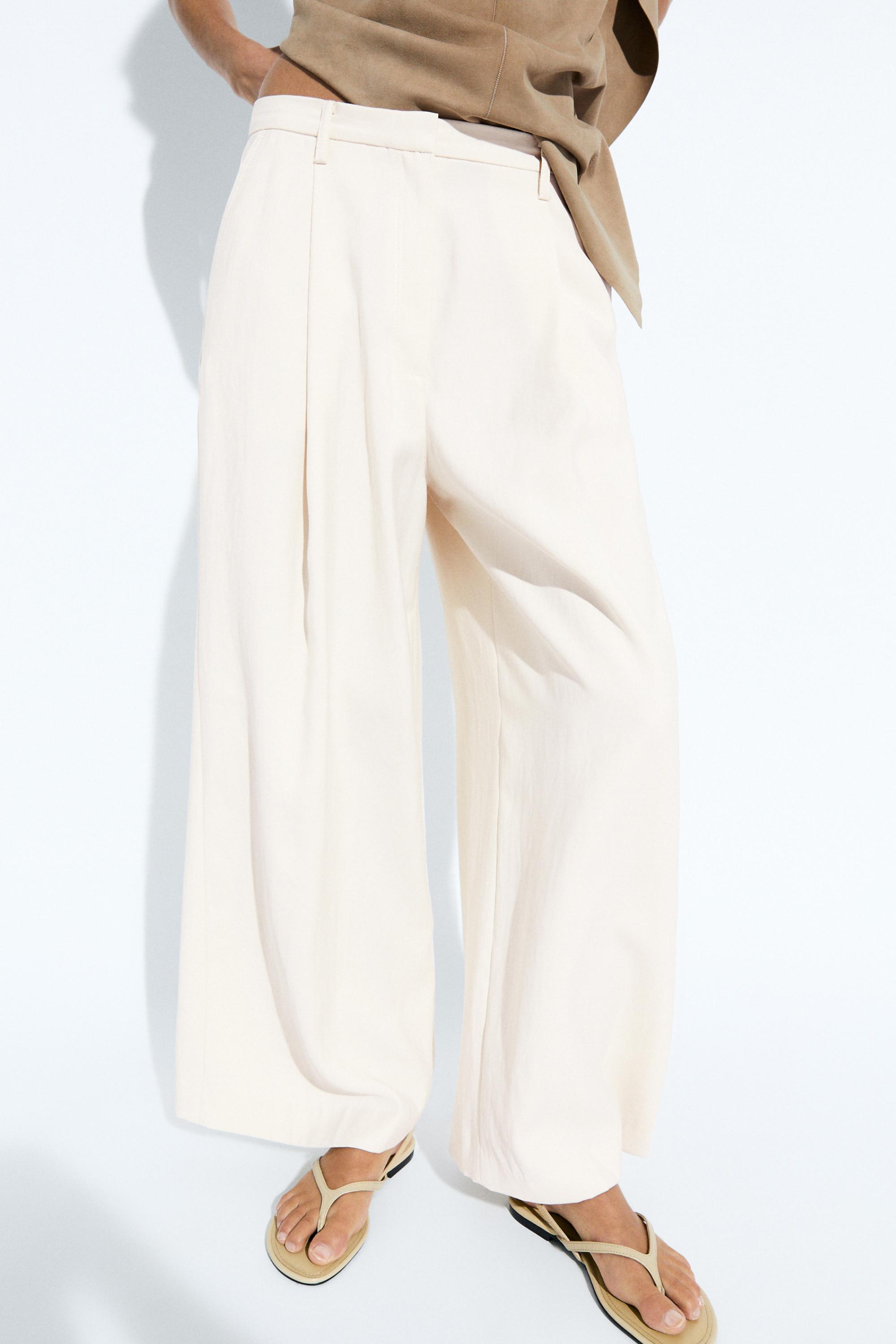 Flowing cropped wide-leg pants — CREAM