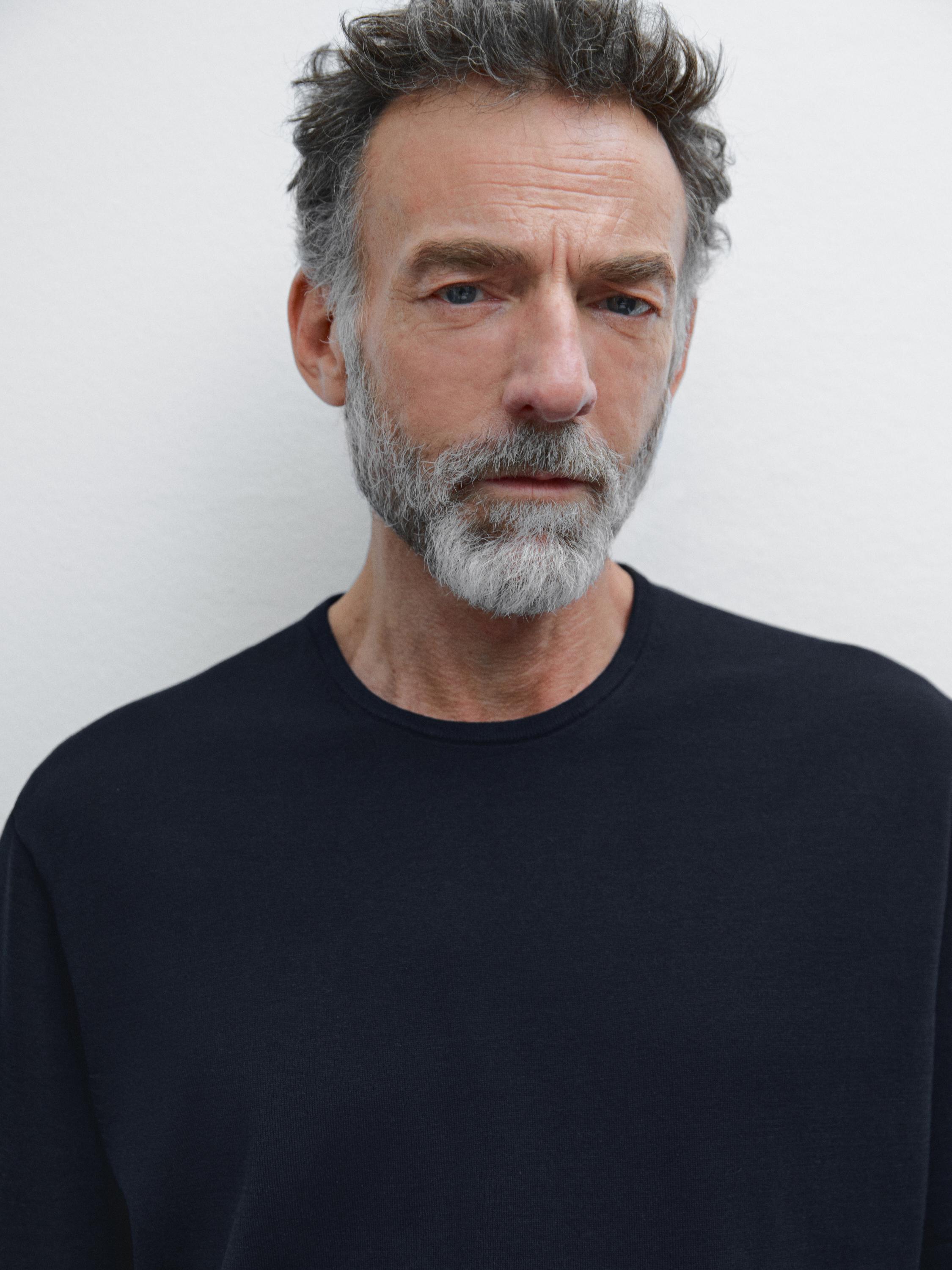 سويتر محاك من القطن المخلوط بأكمام قصيرة