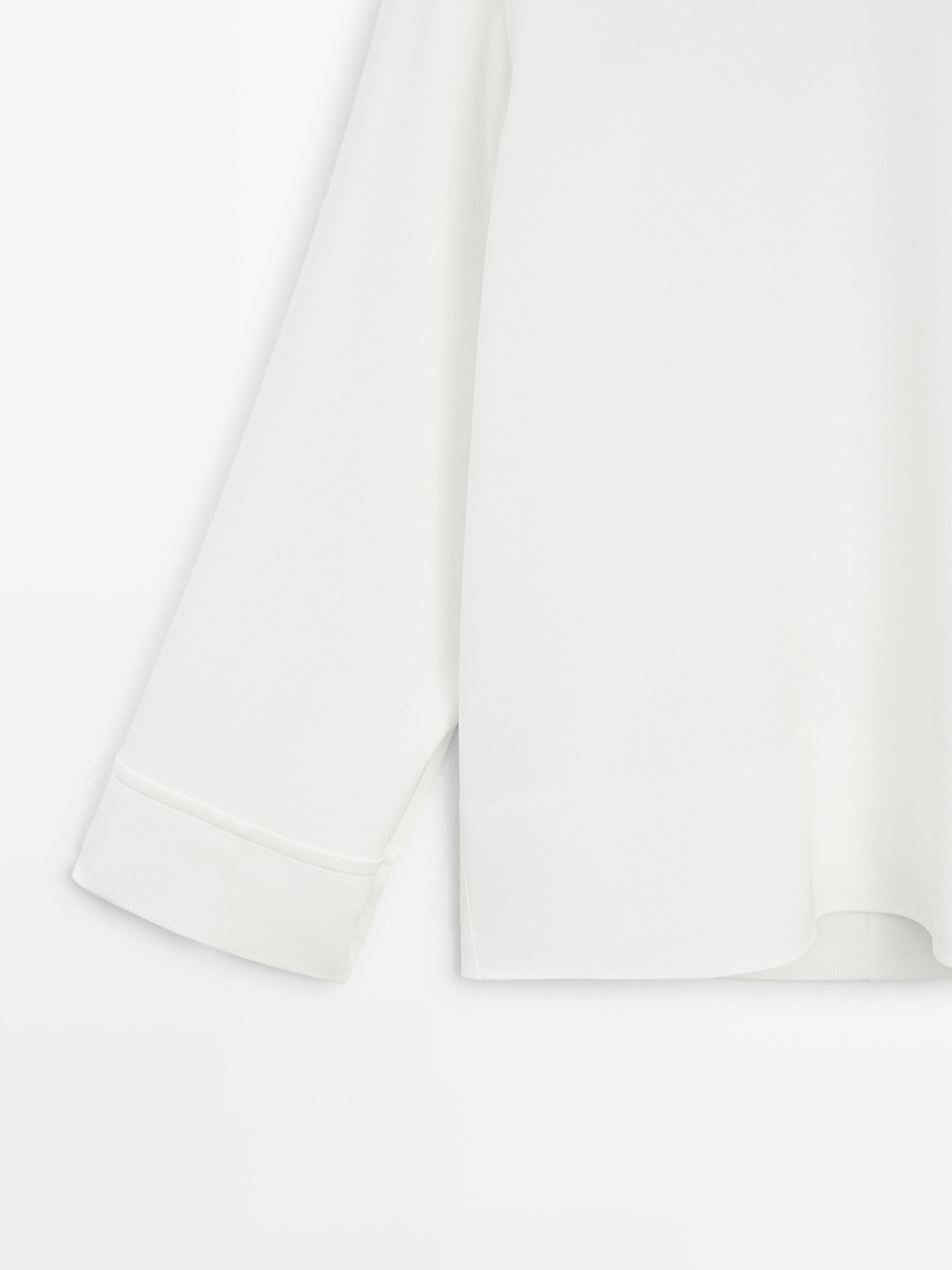High neck blouse with hem detail — WHITE