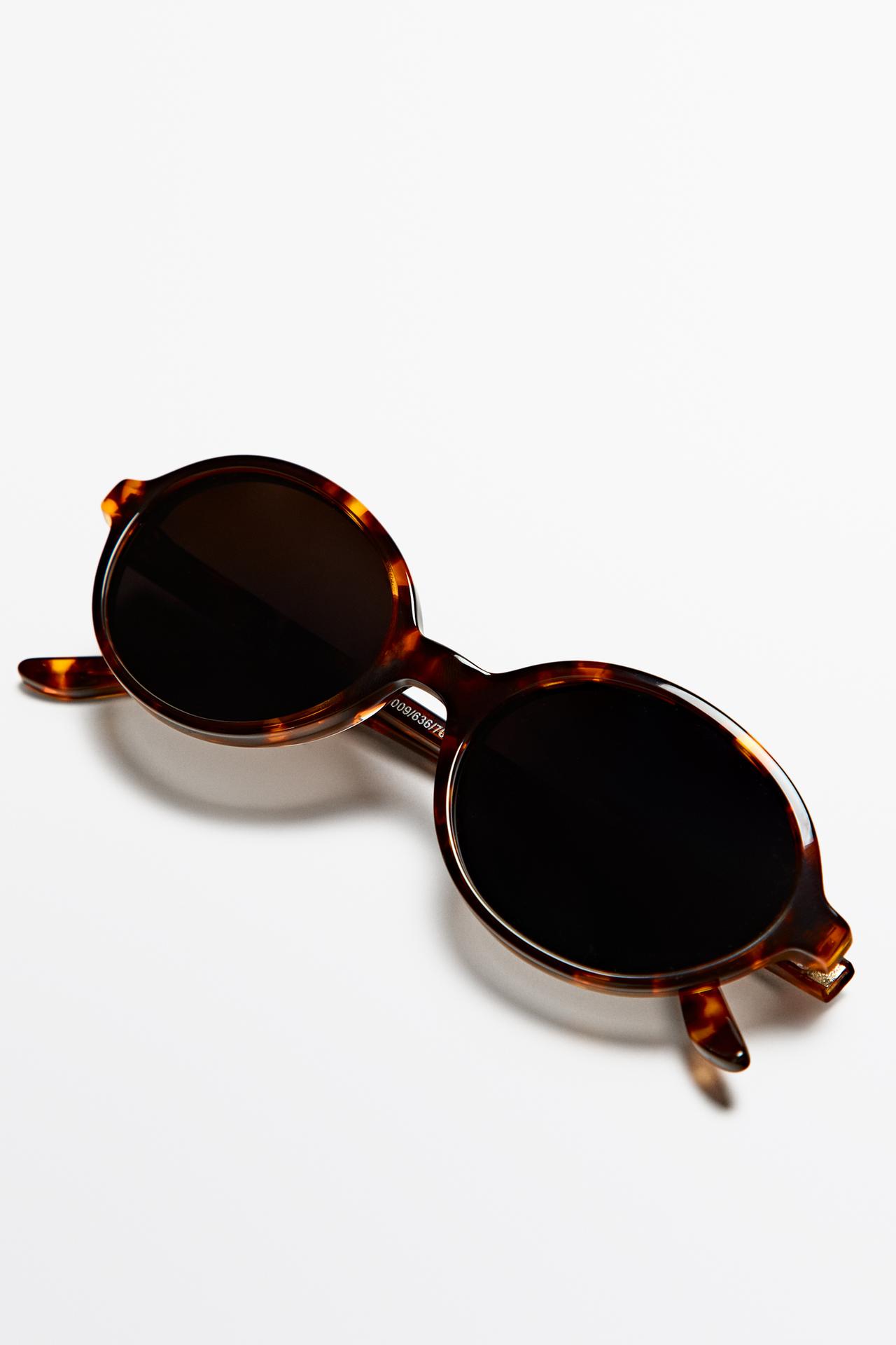 Oval tortoiseshell-effect sunglasses — BROWN