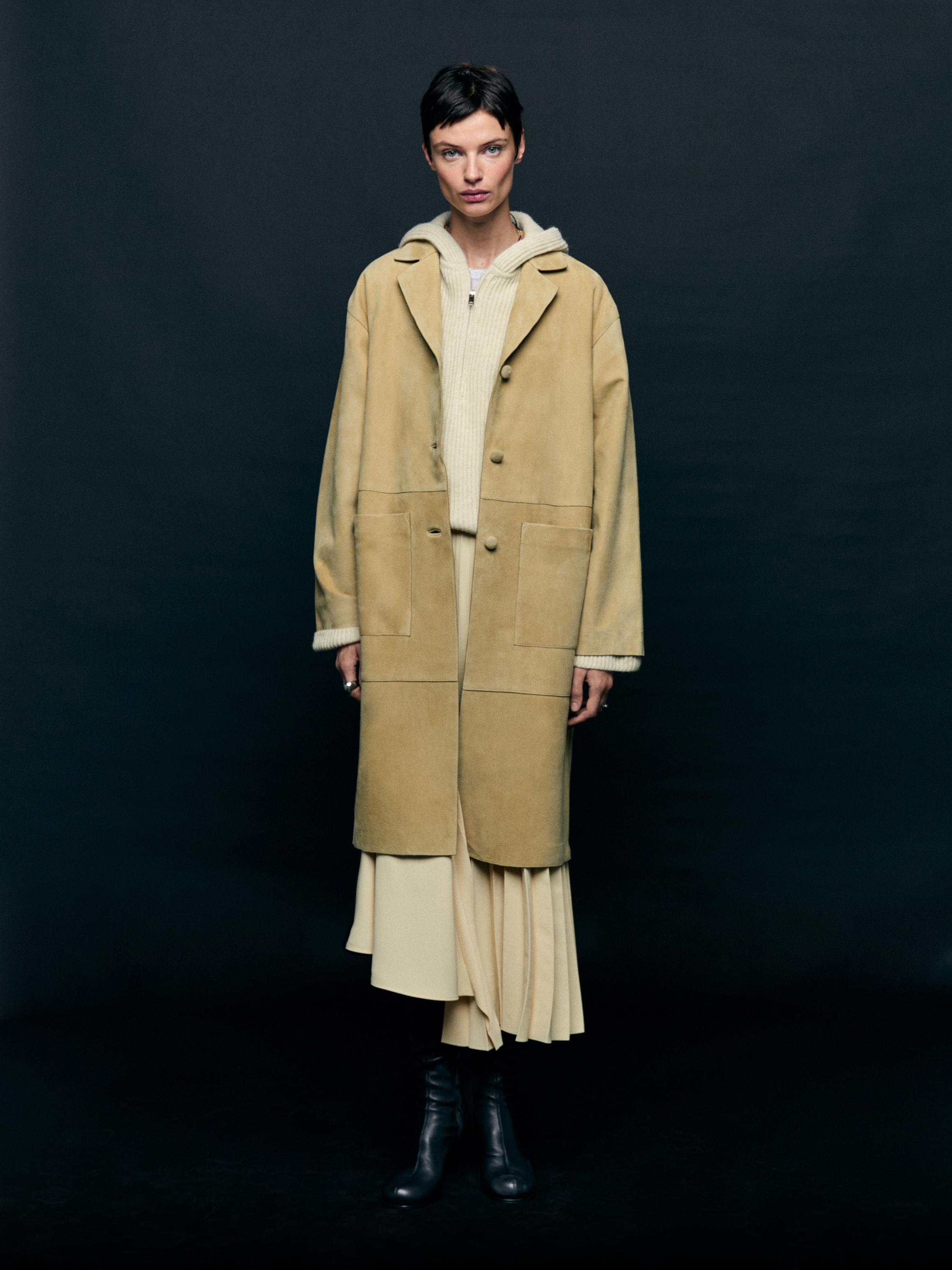 Wool blend sweater with hood detail