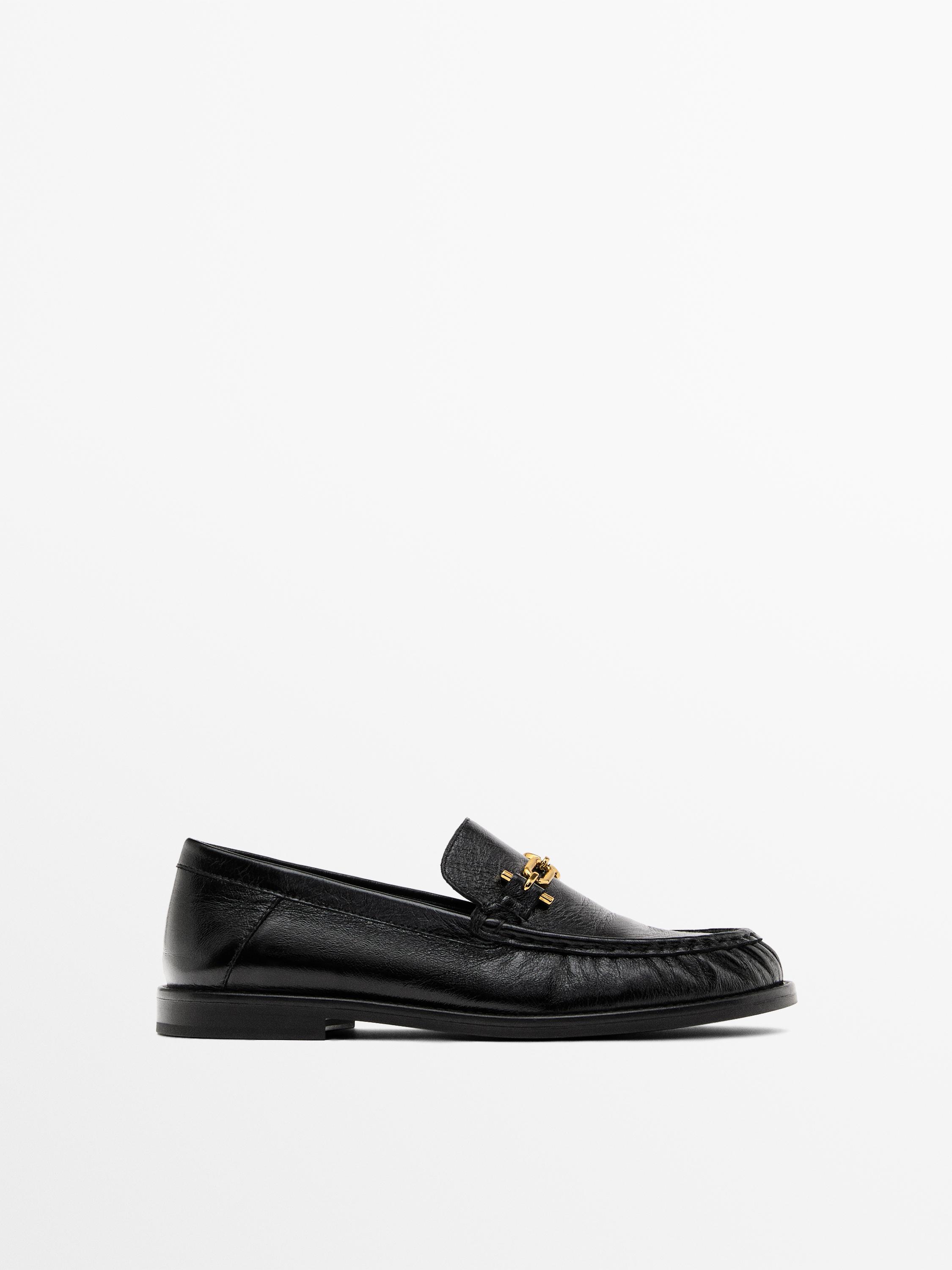 Crackled leather loafers with decorative detail