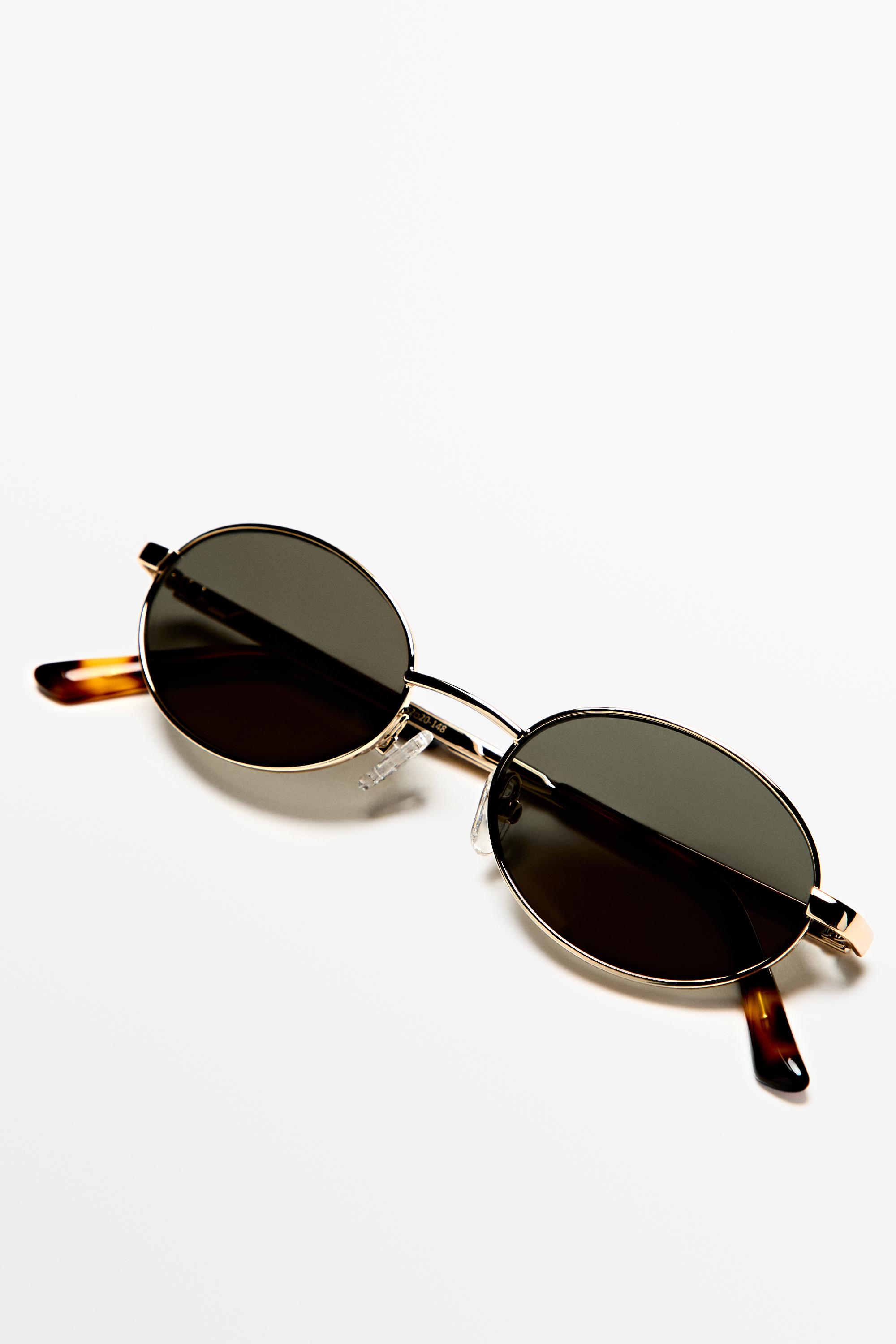 Oval metal sunglasses — GOLDEN
