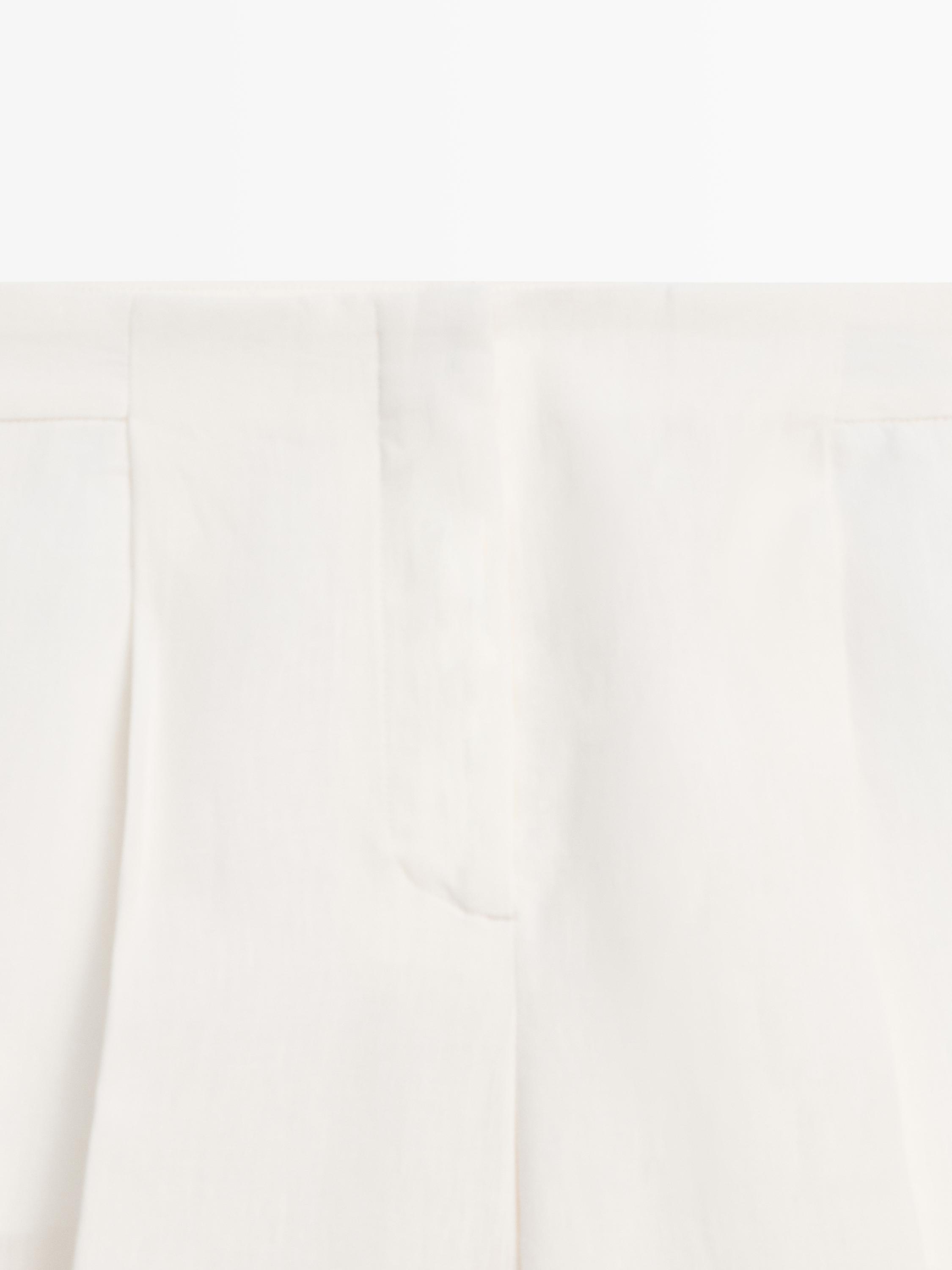 Flowing linen suit trousers — Off white
