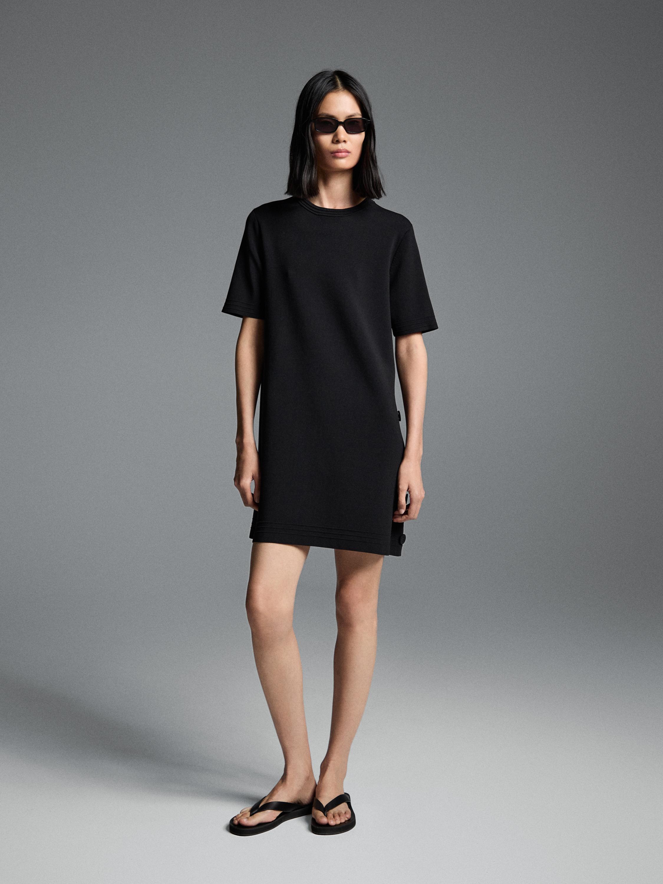 Short knit dress with side button details