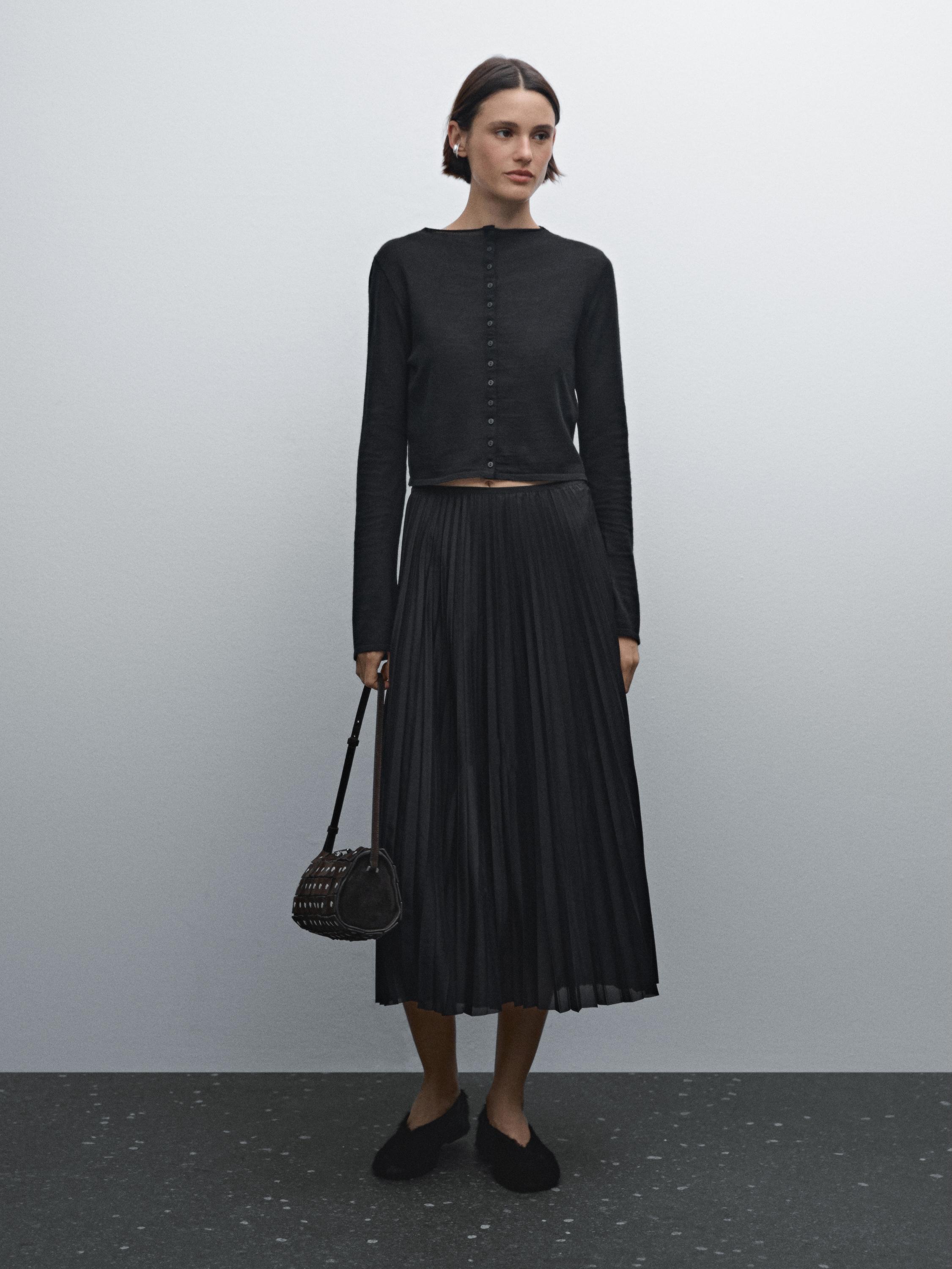 تنورة بليسيه متوسطة الطول بثنيات