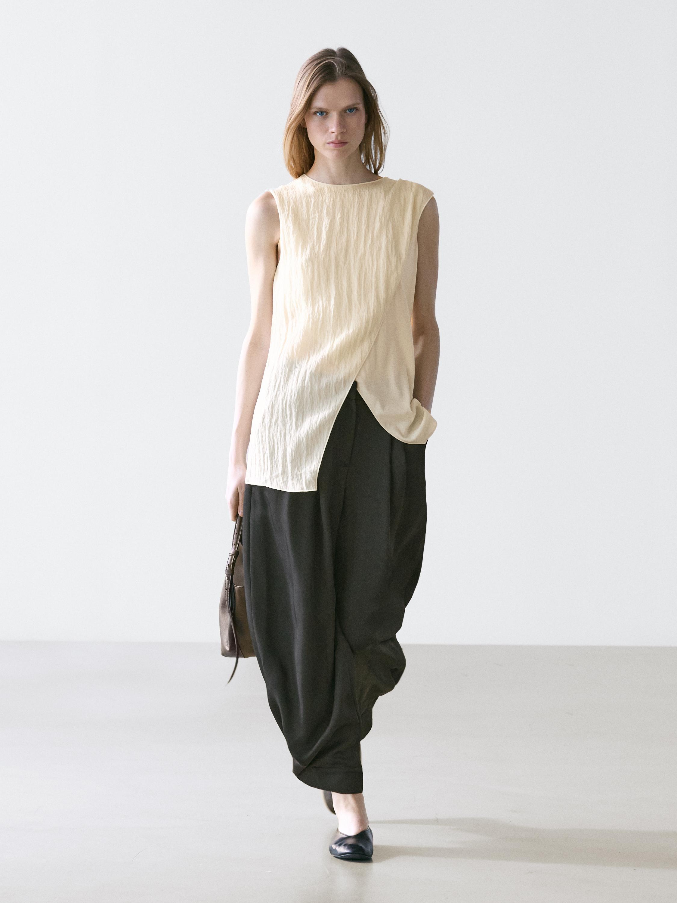 Crossover top with shoulder scarf detail — CREAM