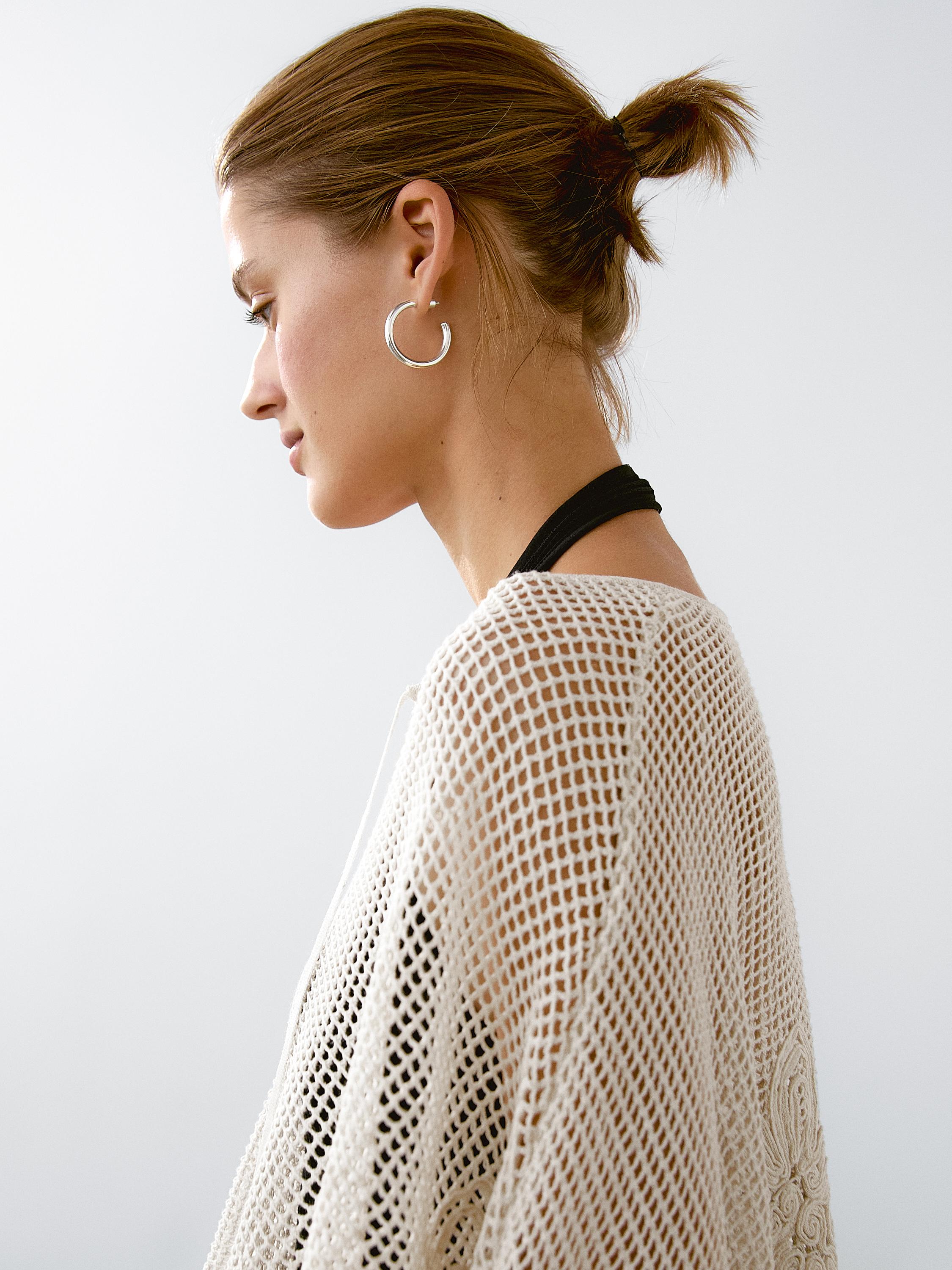 Embroidered cutwork cape