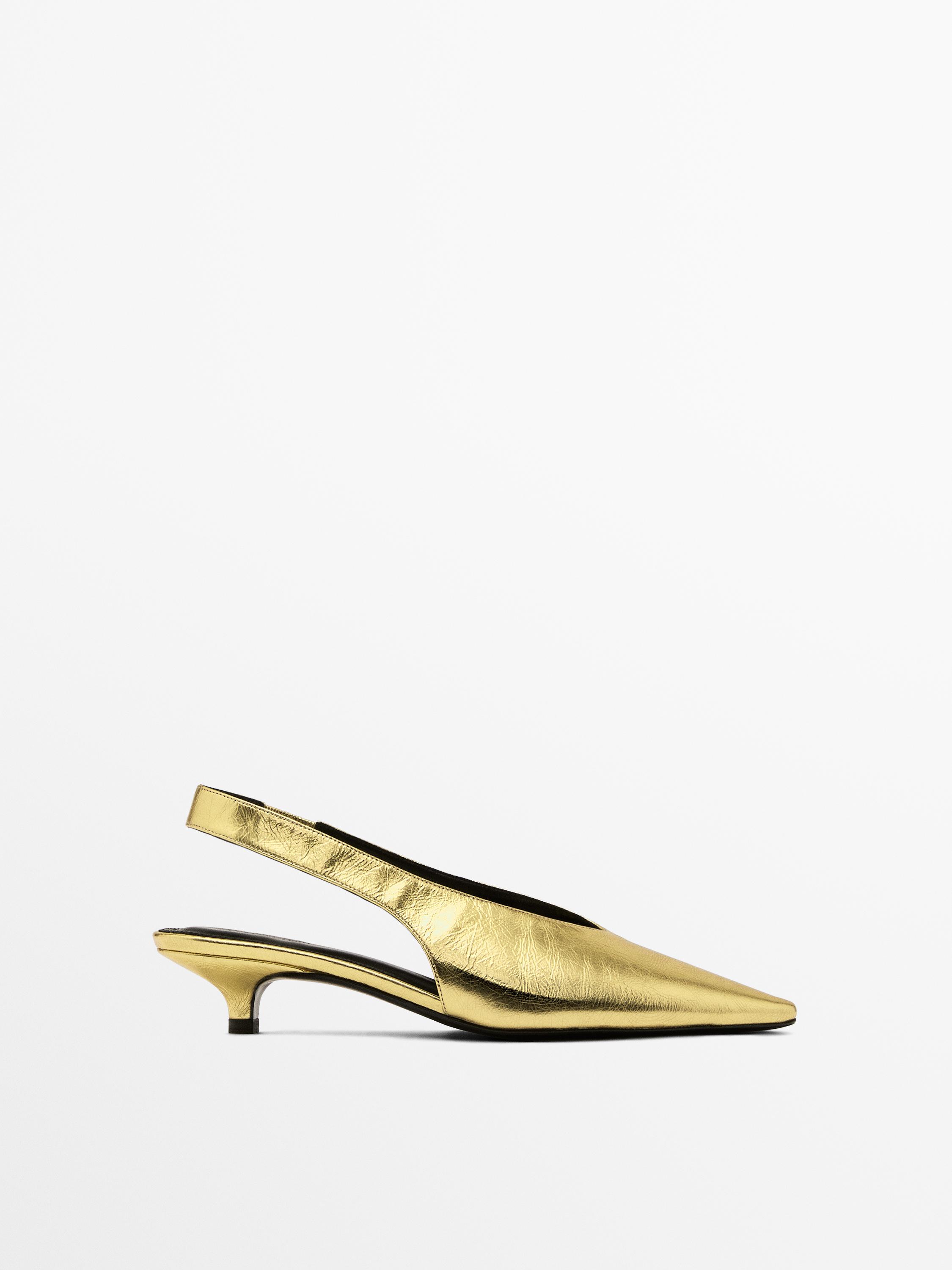 Gold high-heel slingback shoes