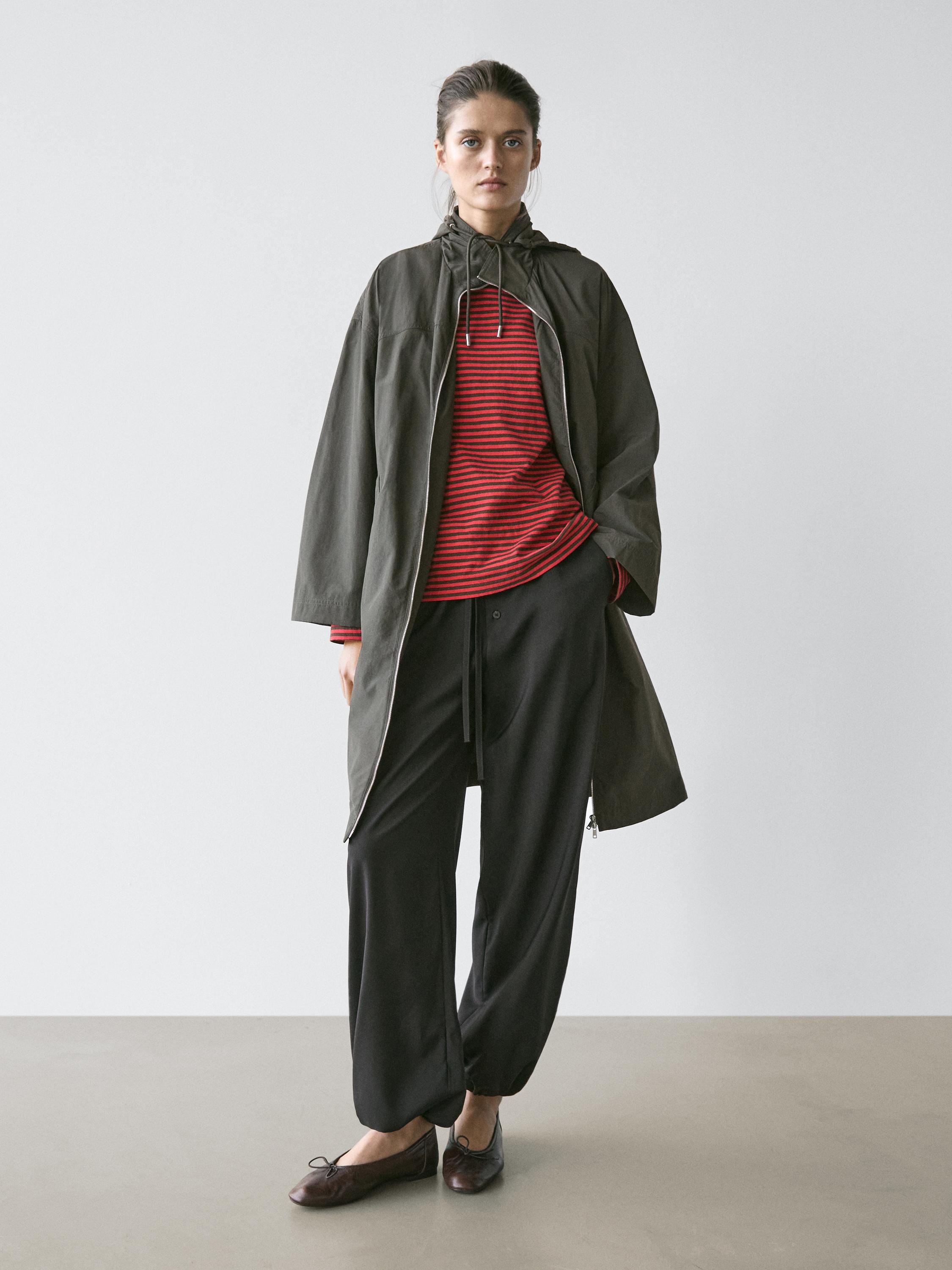 Technical fabric trench coat with hood