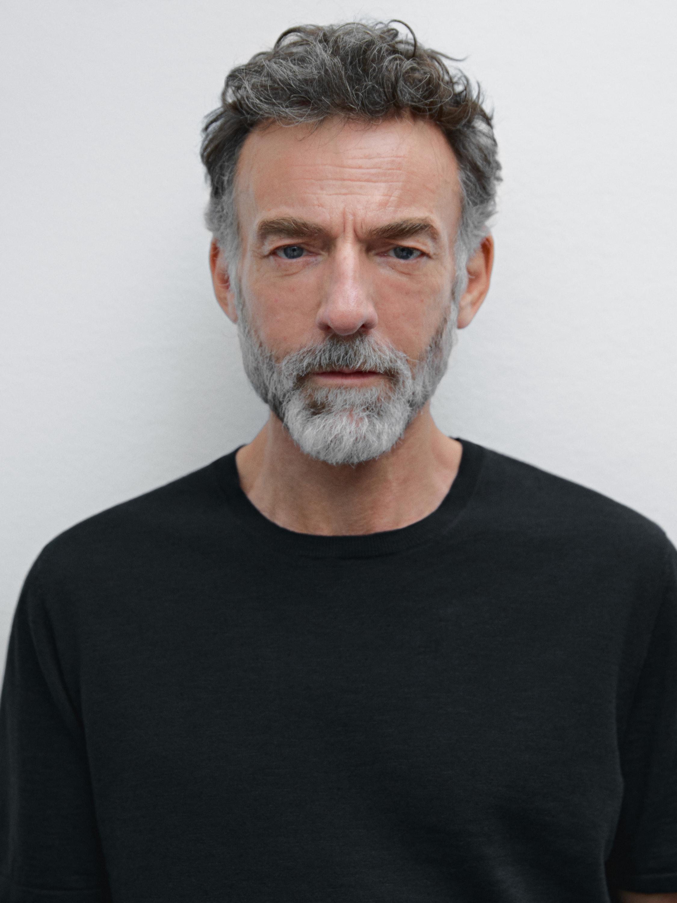 سويتر محاك من القطن المخلوط بأكمام قصيرة