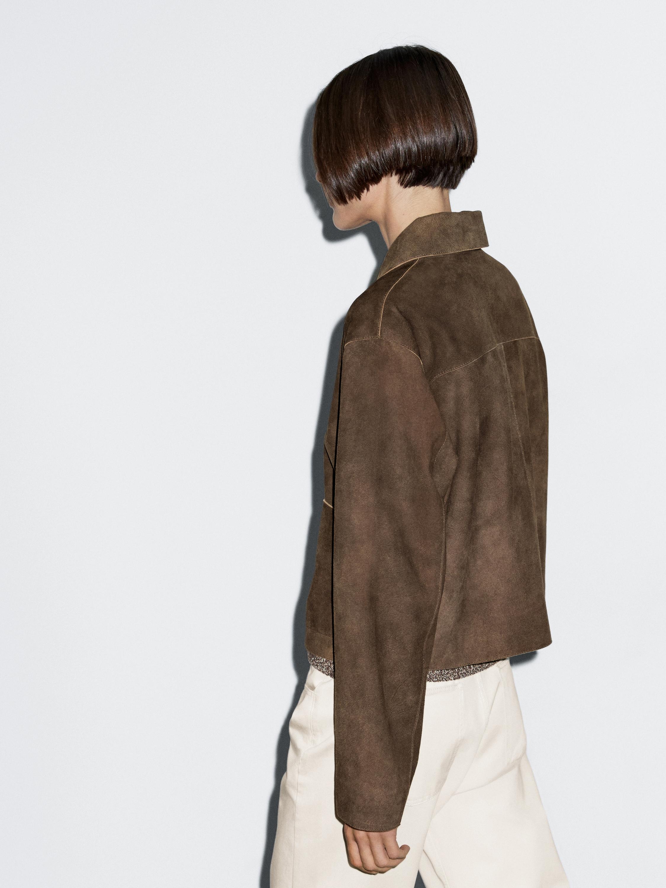 Short suede leather jacket with pocket details