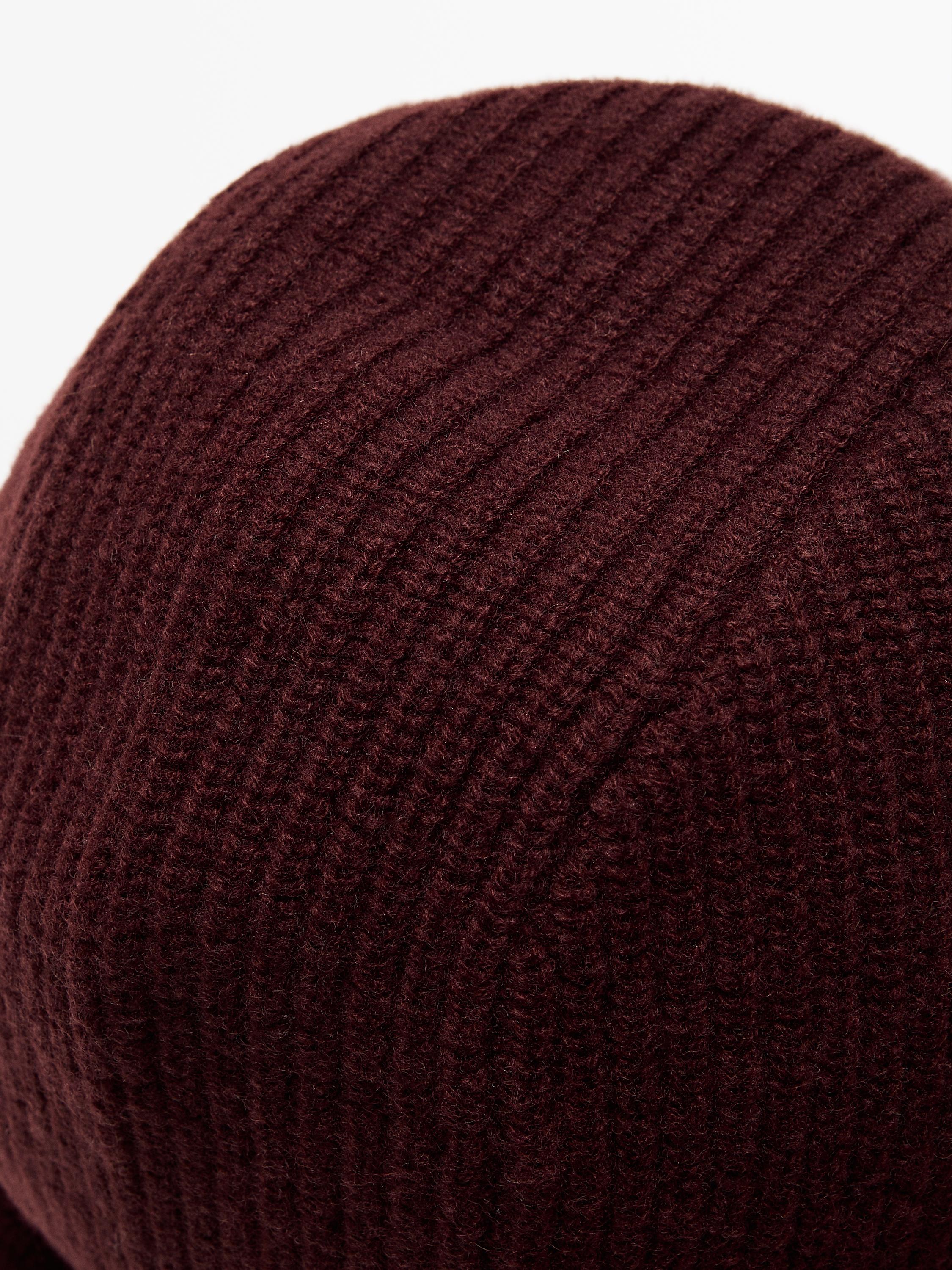 Knit hood with tie